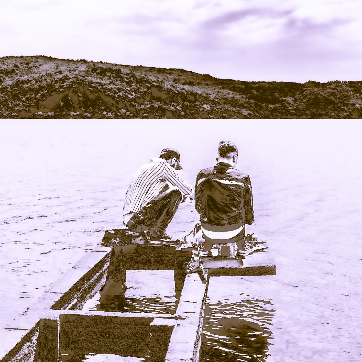 Trikos promontory: fishers on an old jetty