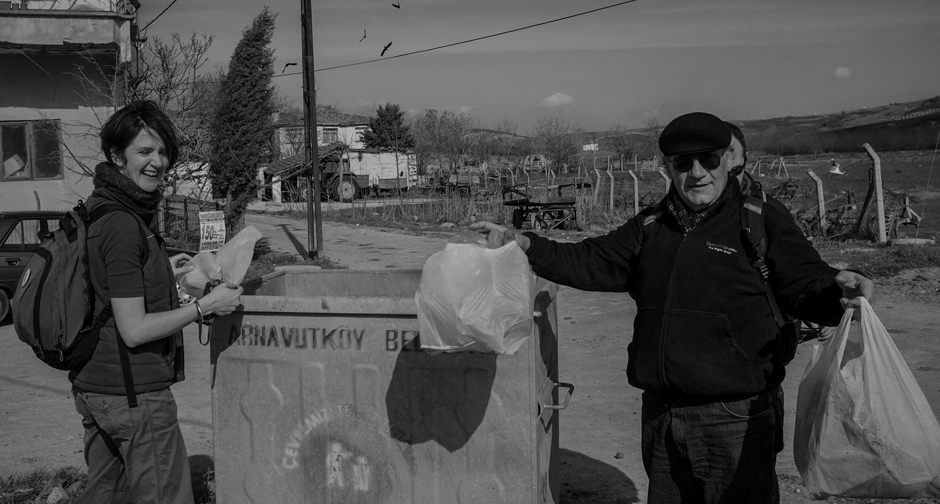 Dursunköy: Kate and Suha offloading some of the rubbish we'd collected on the way between Baklalı and Dursunköy