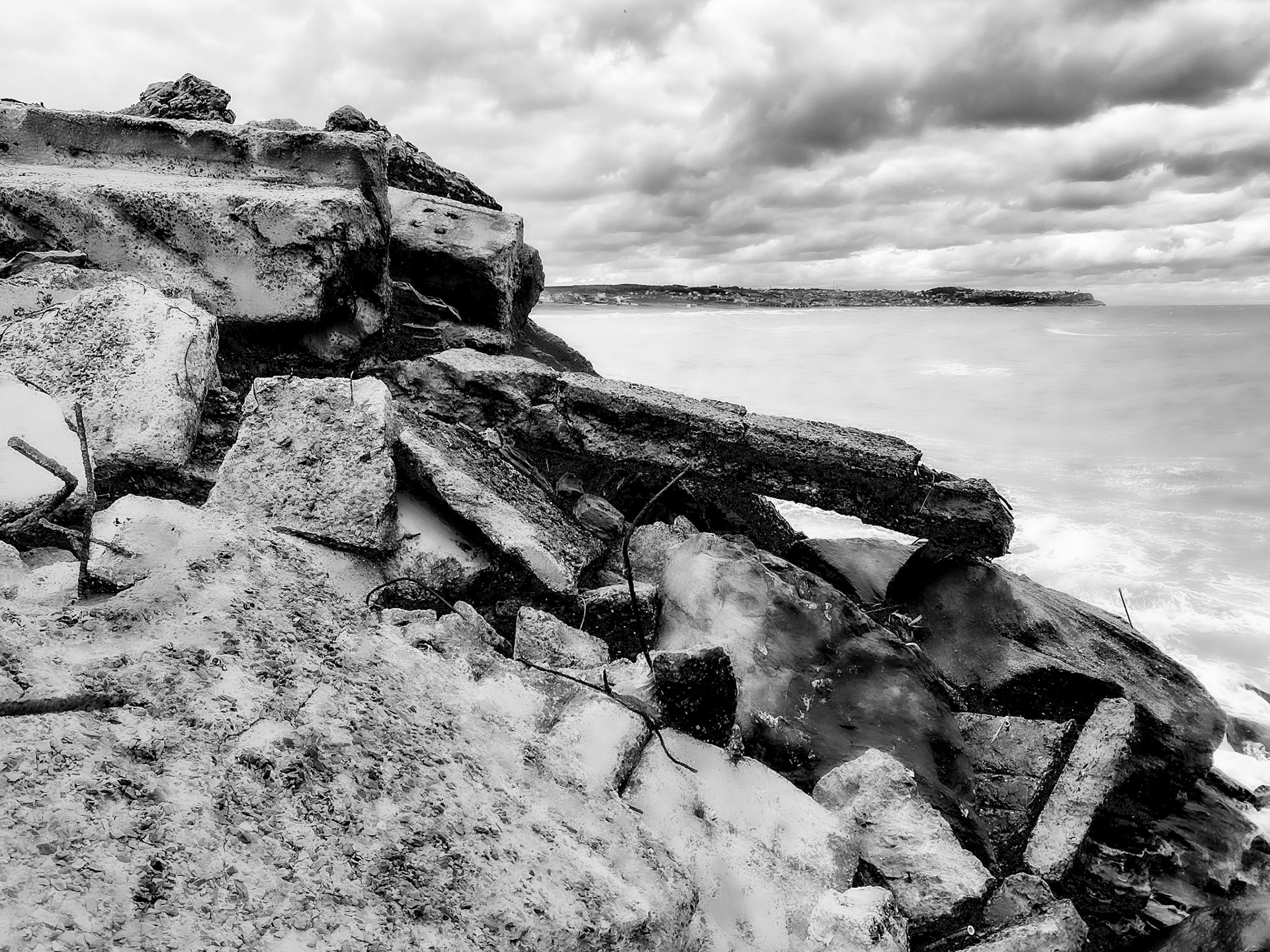 Yeniköy active mining area: dumpings and sea with Karaburun behind