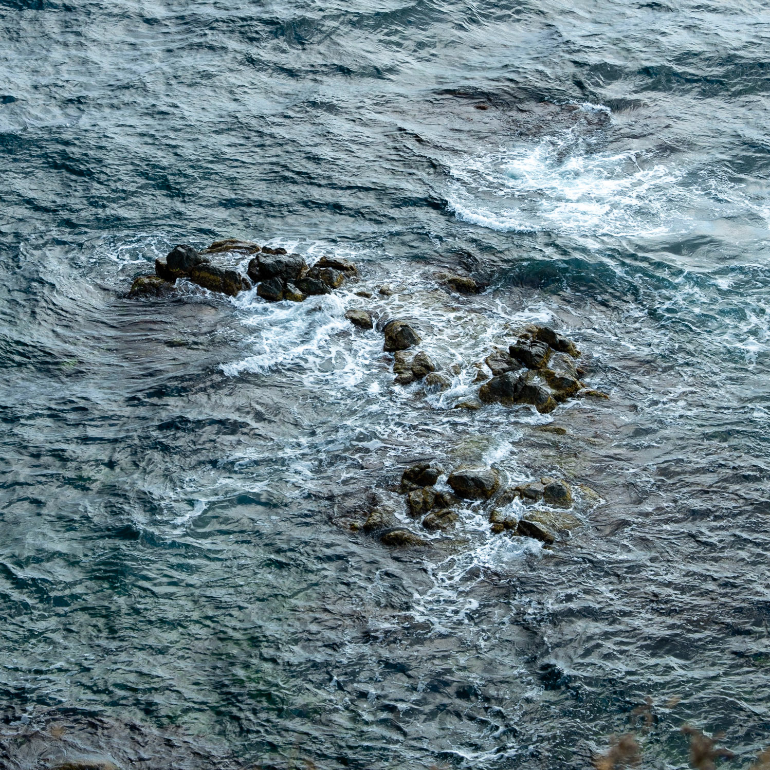 Karaburun basalt rock formations: sea and rocks