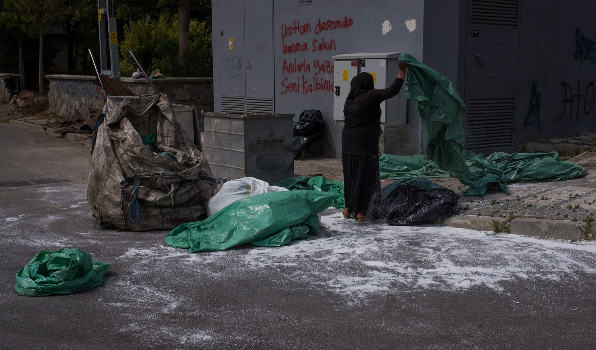 Karatay: a woman (Syrian?) rubbish recycler