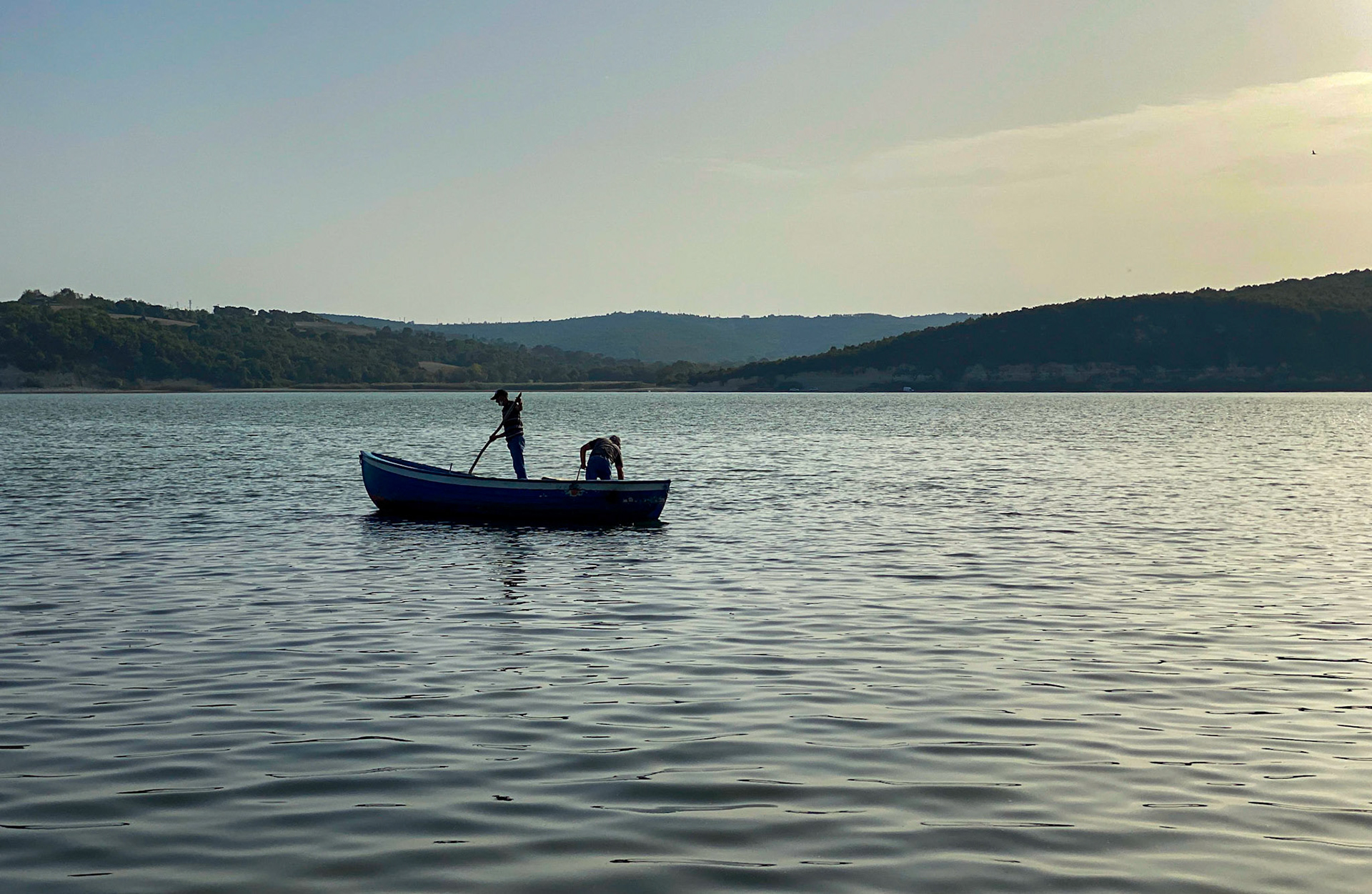 Terkos reservoir: boat and two fishermen