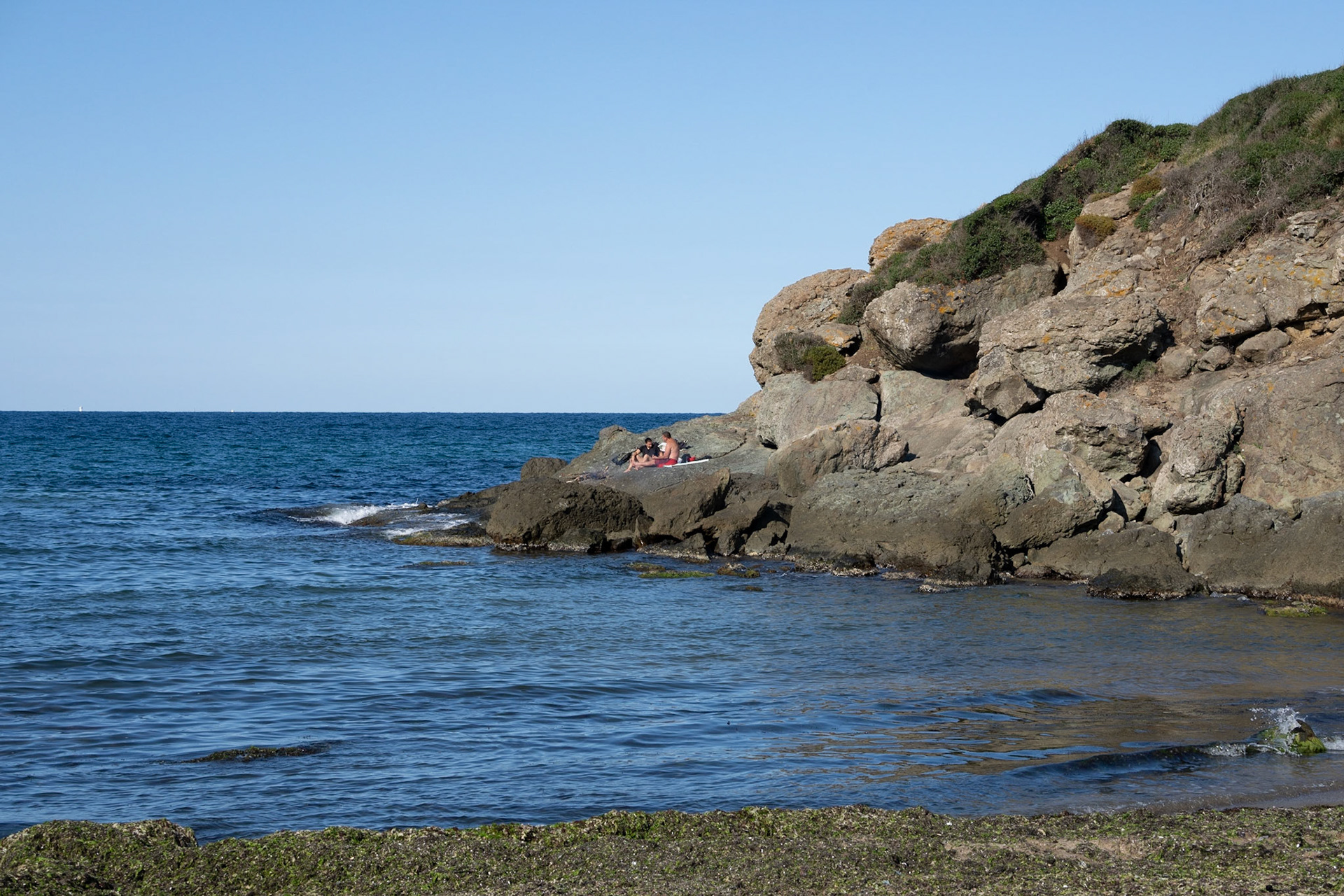 heading west along the line of the Black Sea: picnickers on a headland