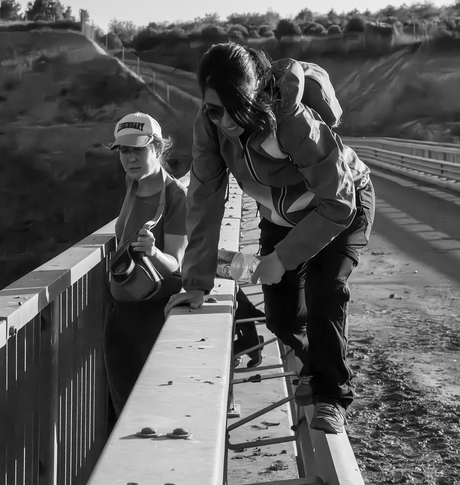 Alibahadır northern woodland: Tasha and Imene crossing the muddy motorway bridge