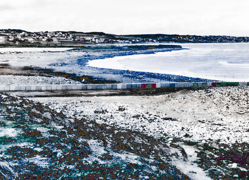 Black Sea coast east of Yeniköy: concrete wall with Yeniköy and Karaburun behind