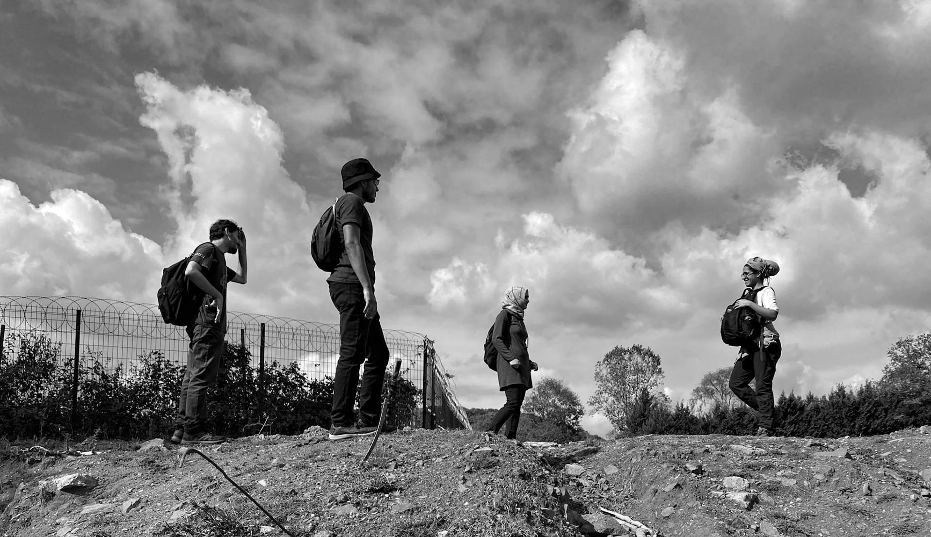 between Göçbeyli and Ballıca: 4 hikers under a cloudy sky