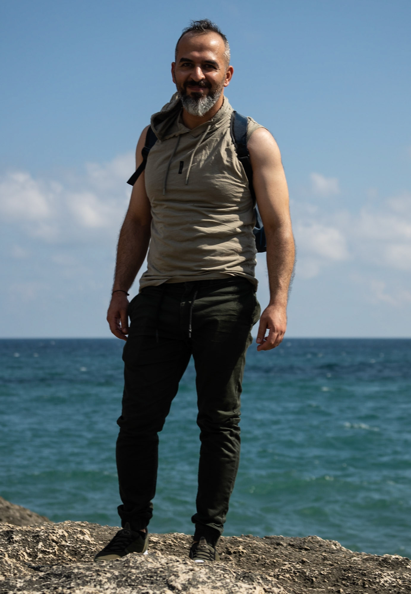 Sahilköy basalt rock formation: muscular hiker