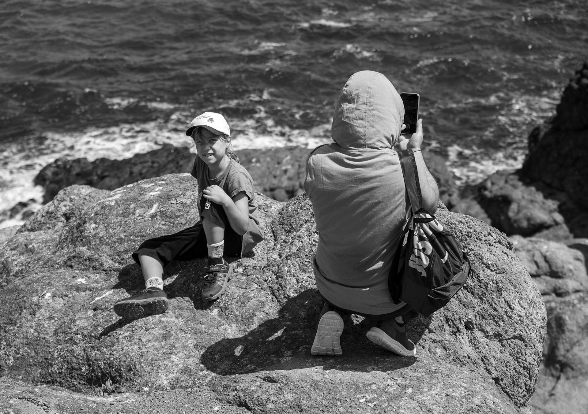 Karaburun basalt rock formations: hikers young and less young