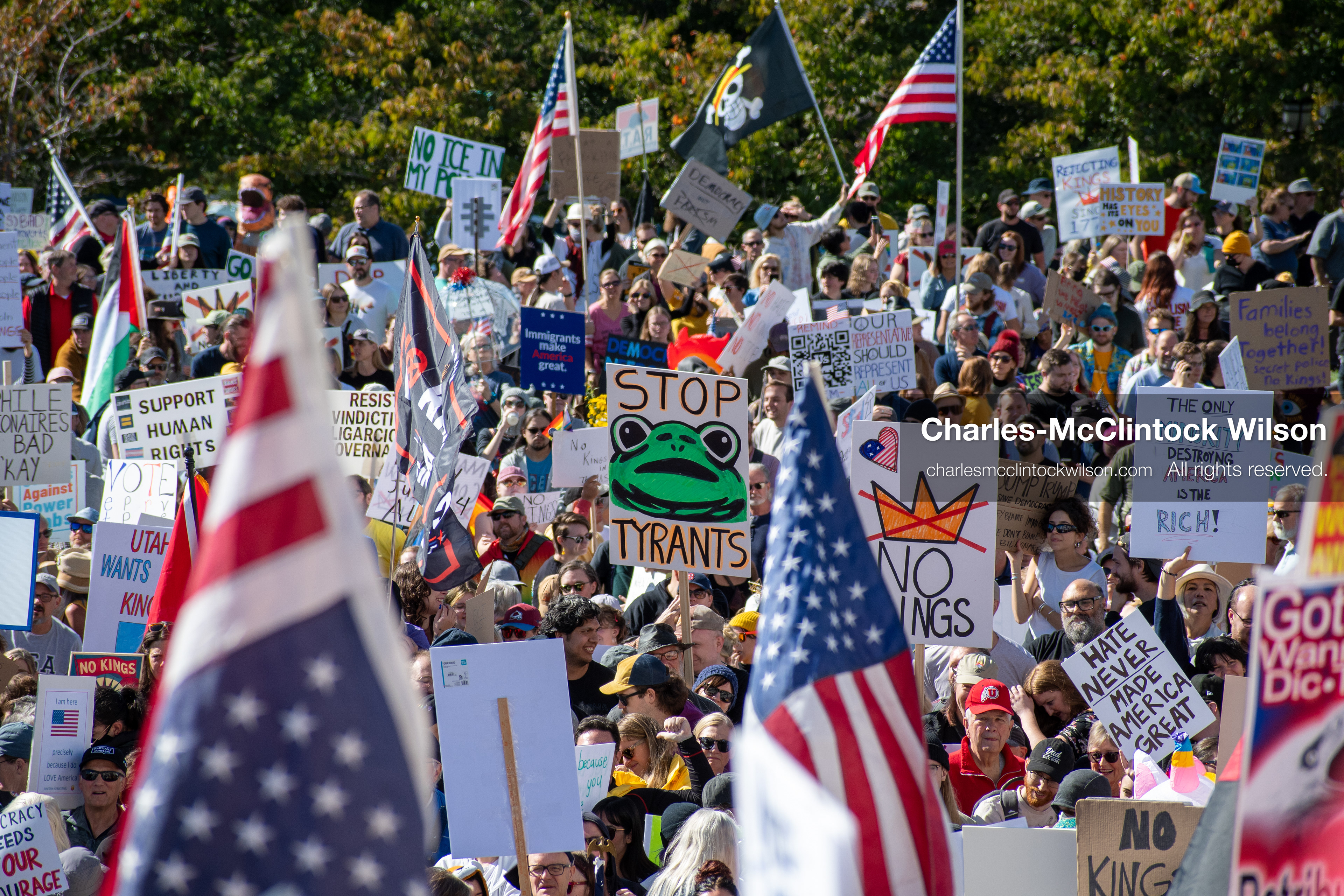 October 18, 2025, Salt Lake City, Utah, USA: Demonstrators participate in a "No Kings" protest held at the Utah State Capitol. Participants hold signs and flags during the public gathering. 