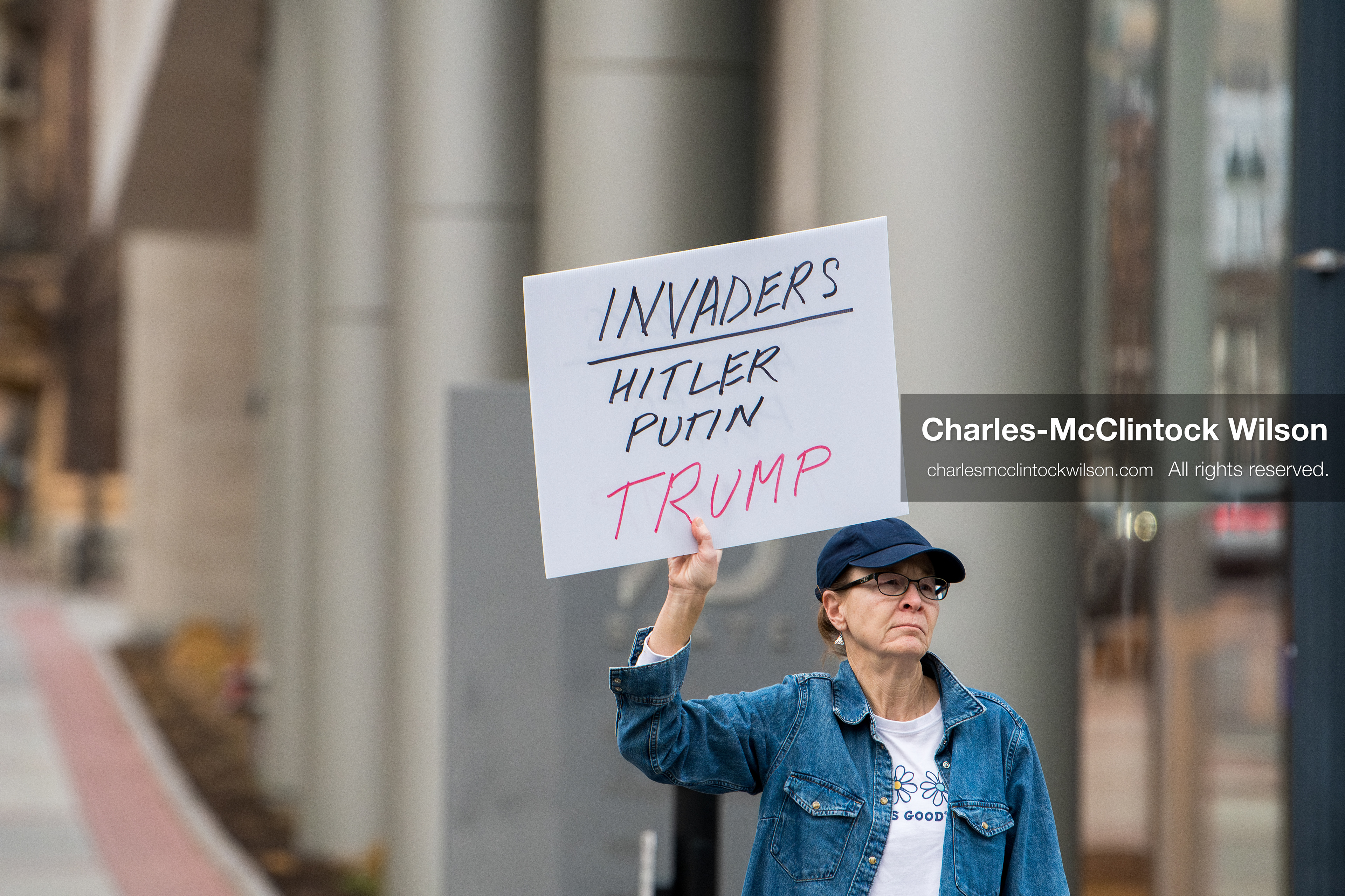 January 3, 2026, Salt Lake City, Utah, USA: A protester holds a sign during a demonstration against US action in Venezuela outside the Wallace Federal Building in Salt Lake City, Utah. The protest was part of a nationwide mobilization responding to recent military developments. (Credit Image: (c) Charles‑McClintock Wilson/ZUMA Press Wire)