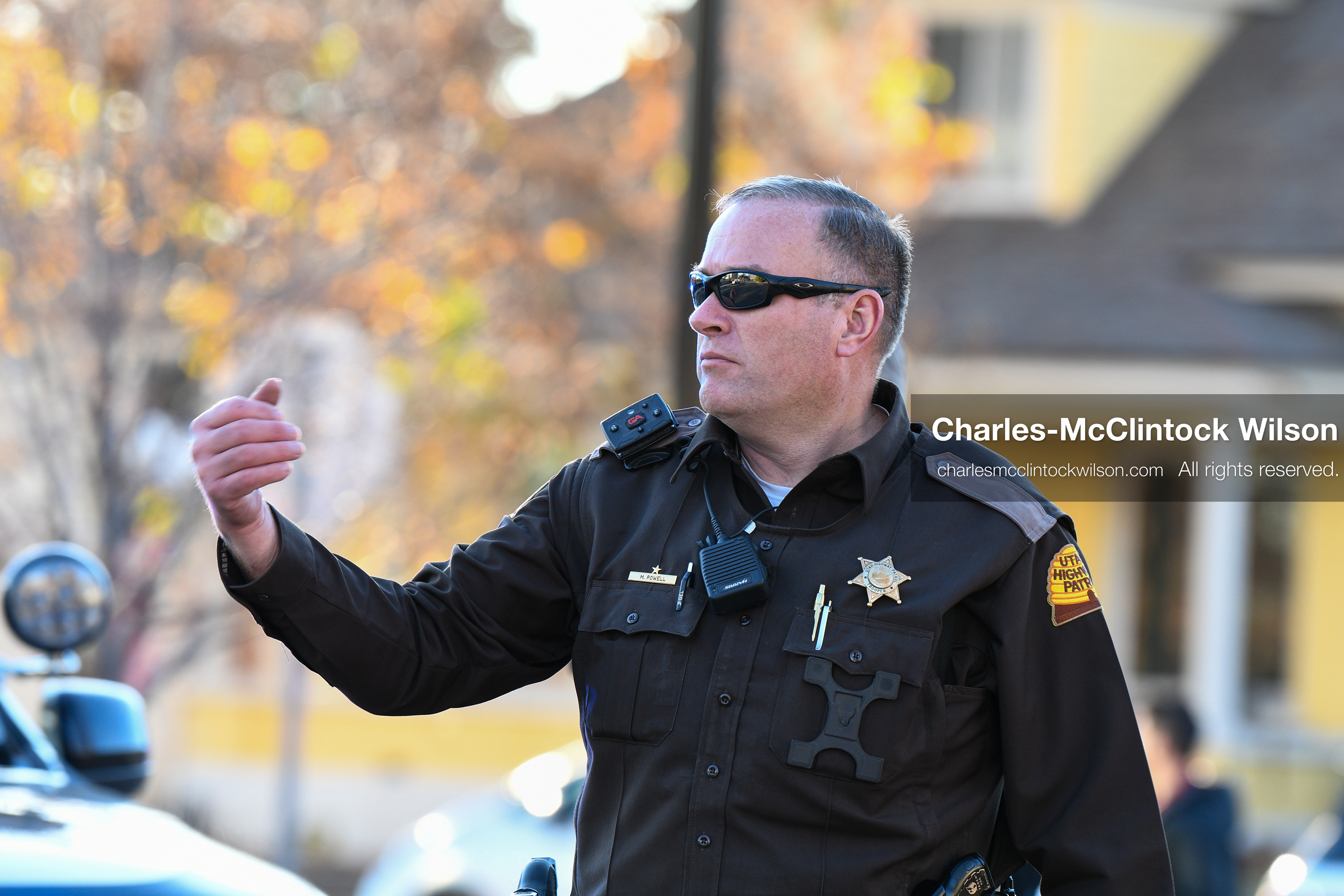 PROVO, UTAH, USA – DECEMBER 11, 2025: A Utah Highway Patrol officer directs traffic near a residence in Provo during the first in‑person court appearance of Tyler Robinson in the Charlie Kirk murder case. (Credit Image: © Charles‑McClintock Wilson/ZUMA Press Wire)