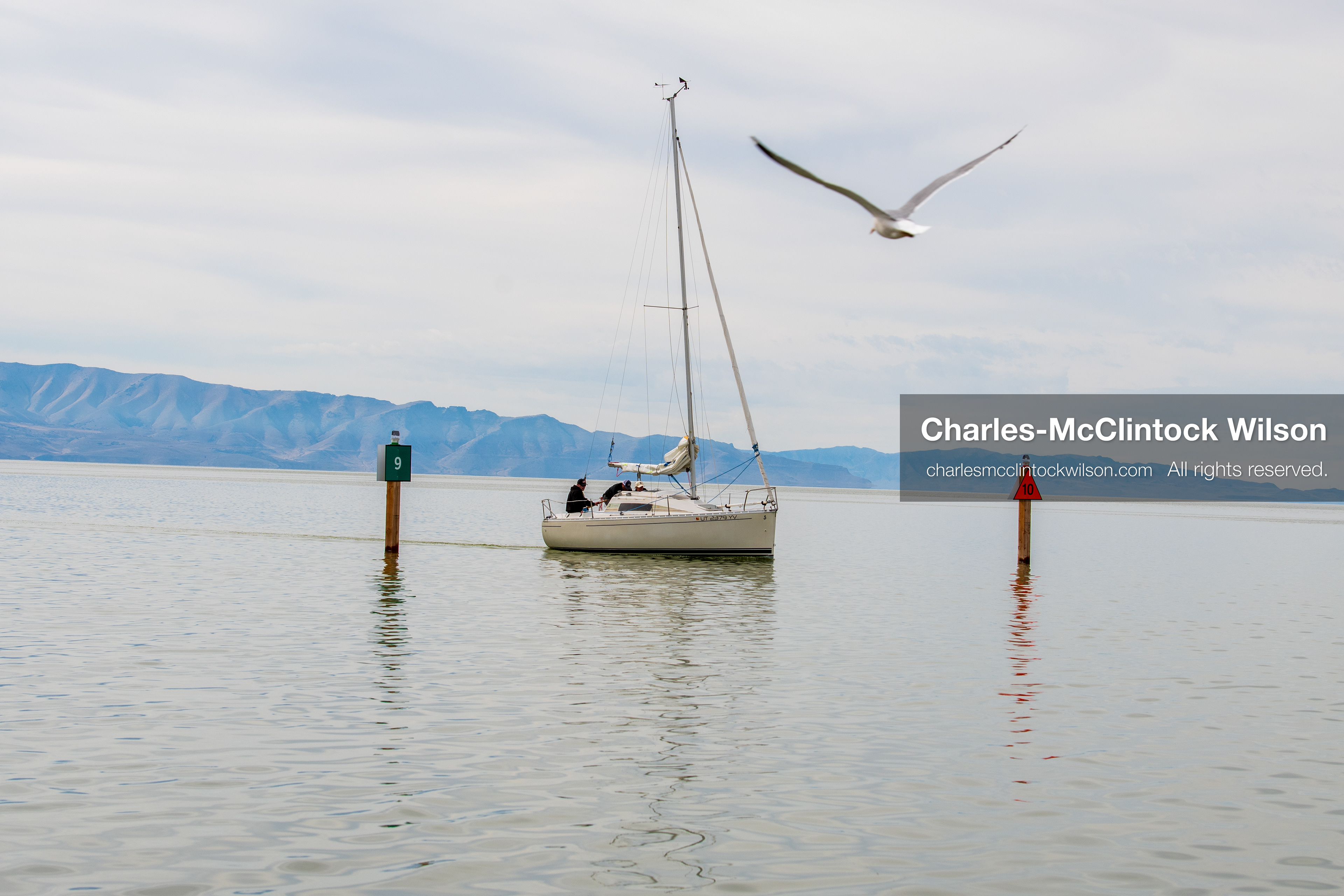 March 1, 2026, Great Salt Lake, Utah, USA: A sailboat moves across calm water at the Great Salt Lake as the region continues to experience historically low water levels. Reports from state officials and the Great Salt Lake Strike Team state that the lake remains in a serious adverse‑effects range, with elevations among the lowest recorded in more than one hundred years. The lake has drawn increased public attention as lawmakers consider large‑scale water projects and long‑term plans to address declining conditions. (Credit Image: © Charles‑McClintock Wilson/ZUMA Press Wire)
