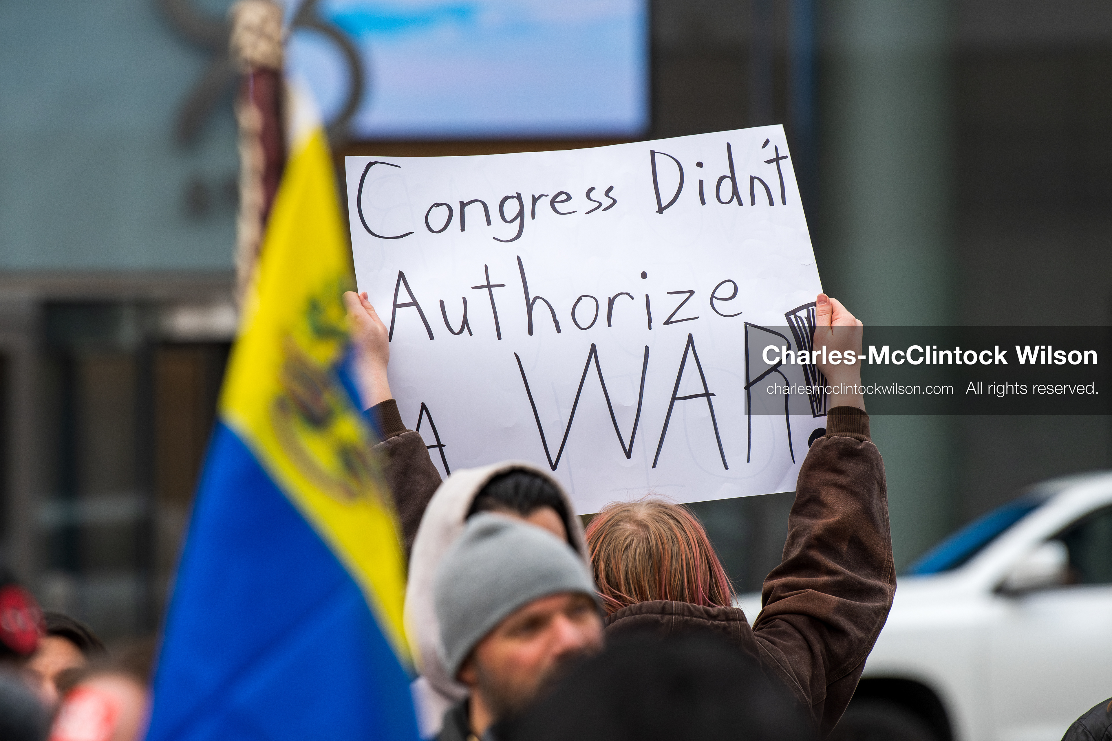 January 3, 2026, Salt Lake City, Utah, USA: A protester holds a sign during a demonstration against US action in Venezuela outside the Wallace Federal Building in Salt Lake City, Utah. The protest was part of a nationwide mobilization responding to recent military developments. (Credit Image: (c) Charles‑McClintock Wilson/ZUMA Press Wire)
