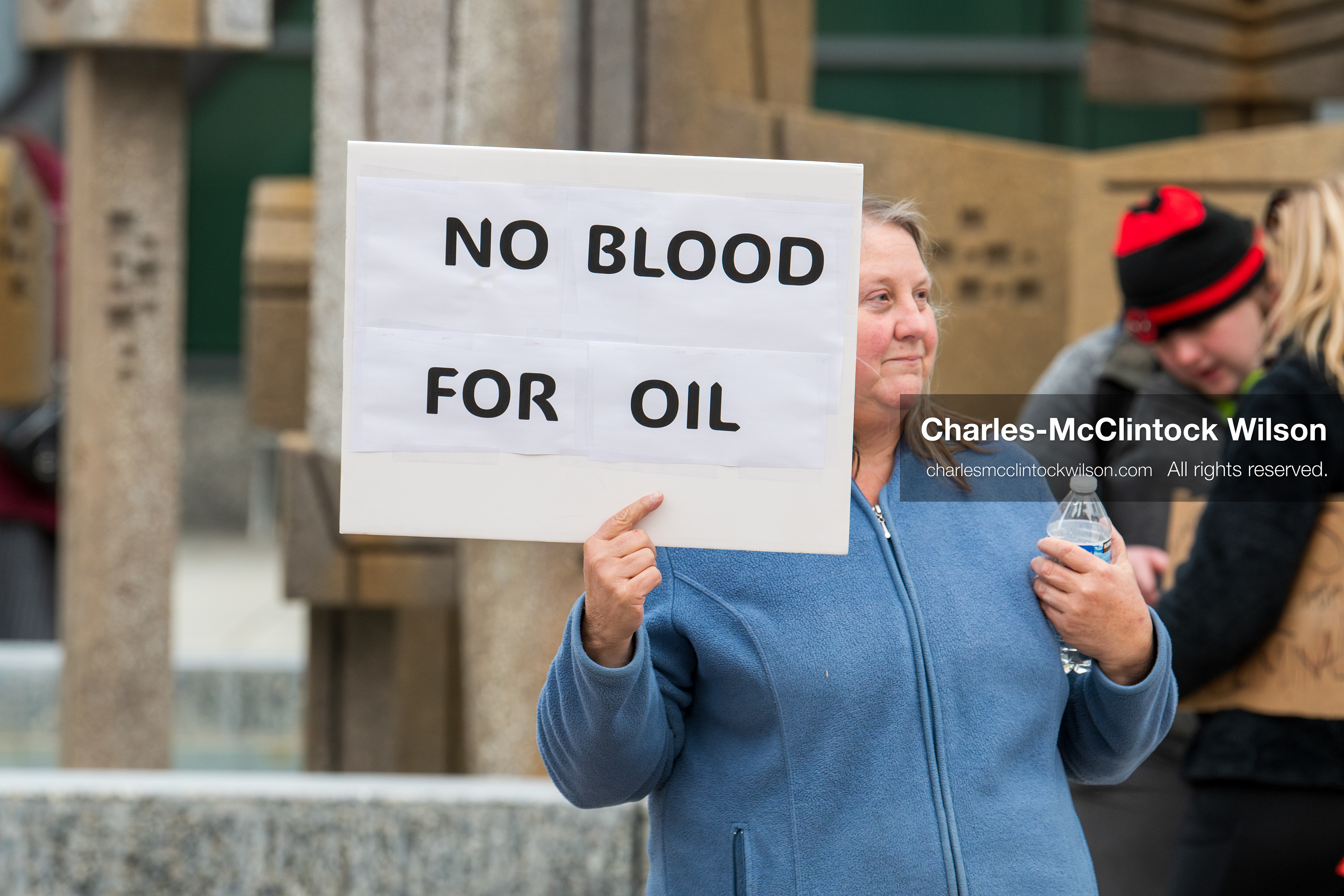 January 3, 2026, Salt Lake City, Utah, USA: A protester holds a sign during a demonstration against US action in Venezuela outside the Wallace Federal Building in Salt Lake City, Utah. The protest was part of a nationwide mobilization responding to recent military developments. (Credit Image: (c) Charles‑McClintock Wilson/ZUMA Press Wire)