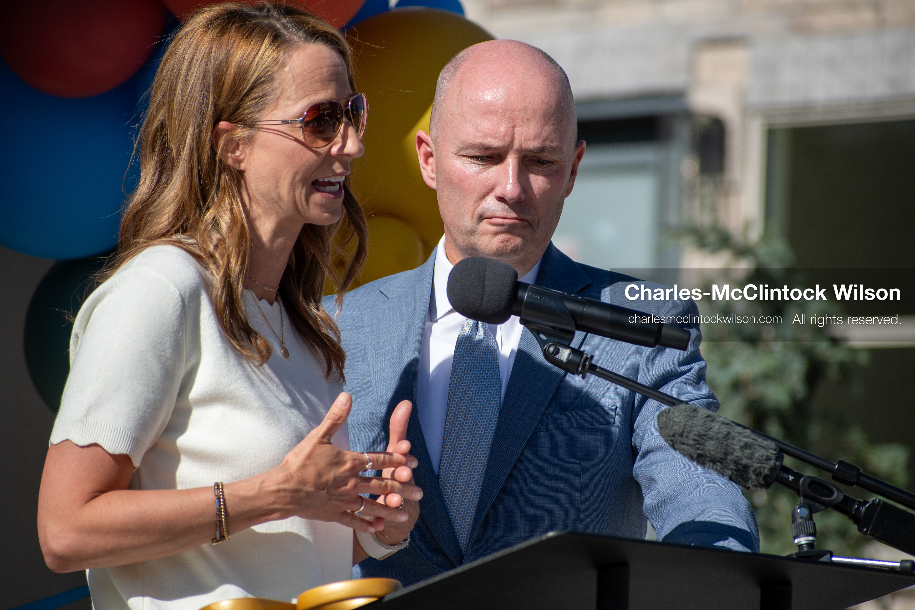 May 28, 2026, Lehi, Utah, USA: Utah First Lady ABBY COX speaks as Governor SPENCER COX looks on during the opening of Innovation Park at Holbrook Farms and the Lehi Rippy Literacy Center on May 28, 2026, in Lehi, Utah. (Credit Image: © Charles‑McClintock Wilson/ZUMA Press Wire)