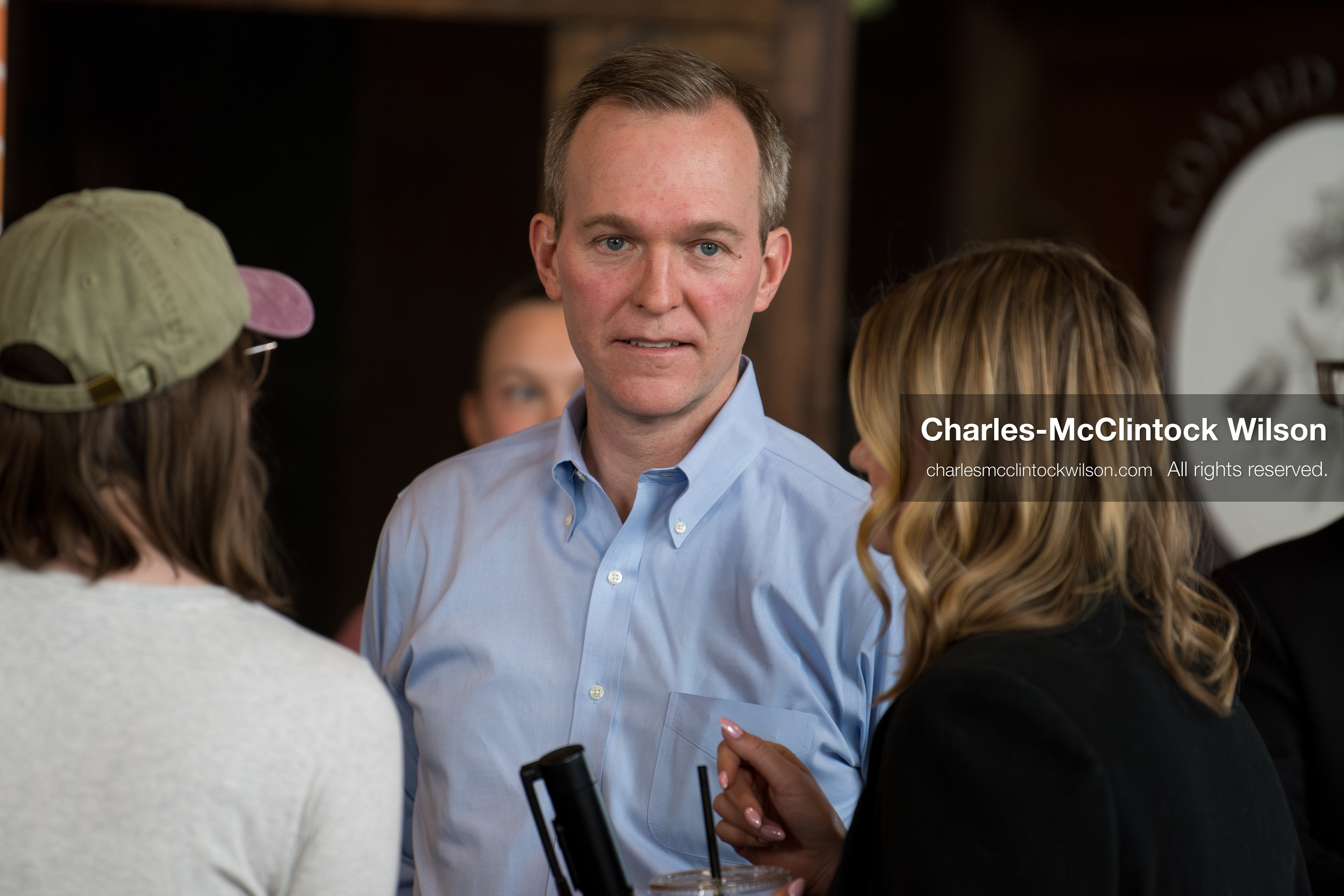 April 22, 2026, Salt Lake City, Utah, USA: Democratic congressional candidate BEN McADAMS speaks with attendees before the Earth Day 1st District Candidate Debate at Church and State Marketplace. The event, hosted by Stewardship Utah, brought together candidates to discuss environmental and policy issues ahead of the 2026 election. (Credit Image: © Charles-McClintock Wilson/ZUMA Press Wire)