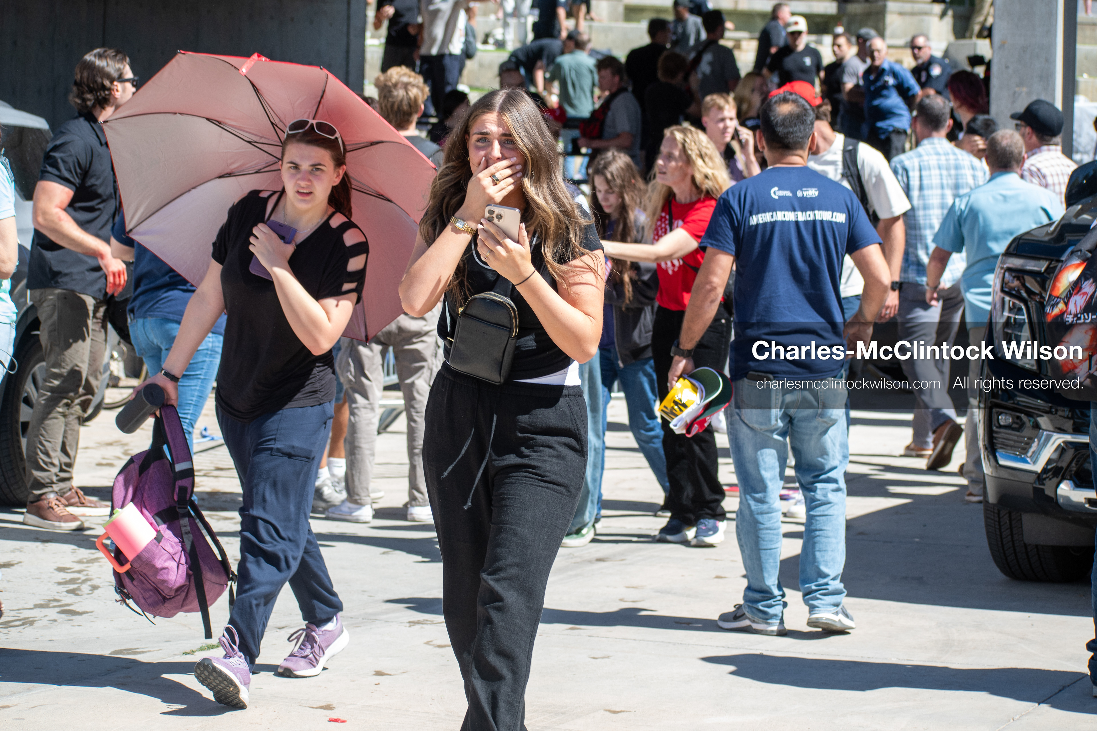 September 10, 2025, Orem, Utah, USA: Attendees flee the scene moments after conservative activist Charlie Kirk is shot during a public event at Utah Valley University. The shooting occurs during a Q&A session with students, approximately two minutes into the exchange. Kirk appears to be struck in the neck. The campus is evacuated as emergency protocols are activated. A university spokesperson states that no suspect is in custody at the time, though an earlier campus alert indicated that police had detained an individual. (Credit Image: © Charles-McClintock Wilson/ZUMA Press Wire)
