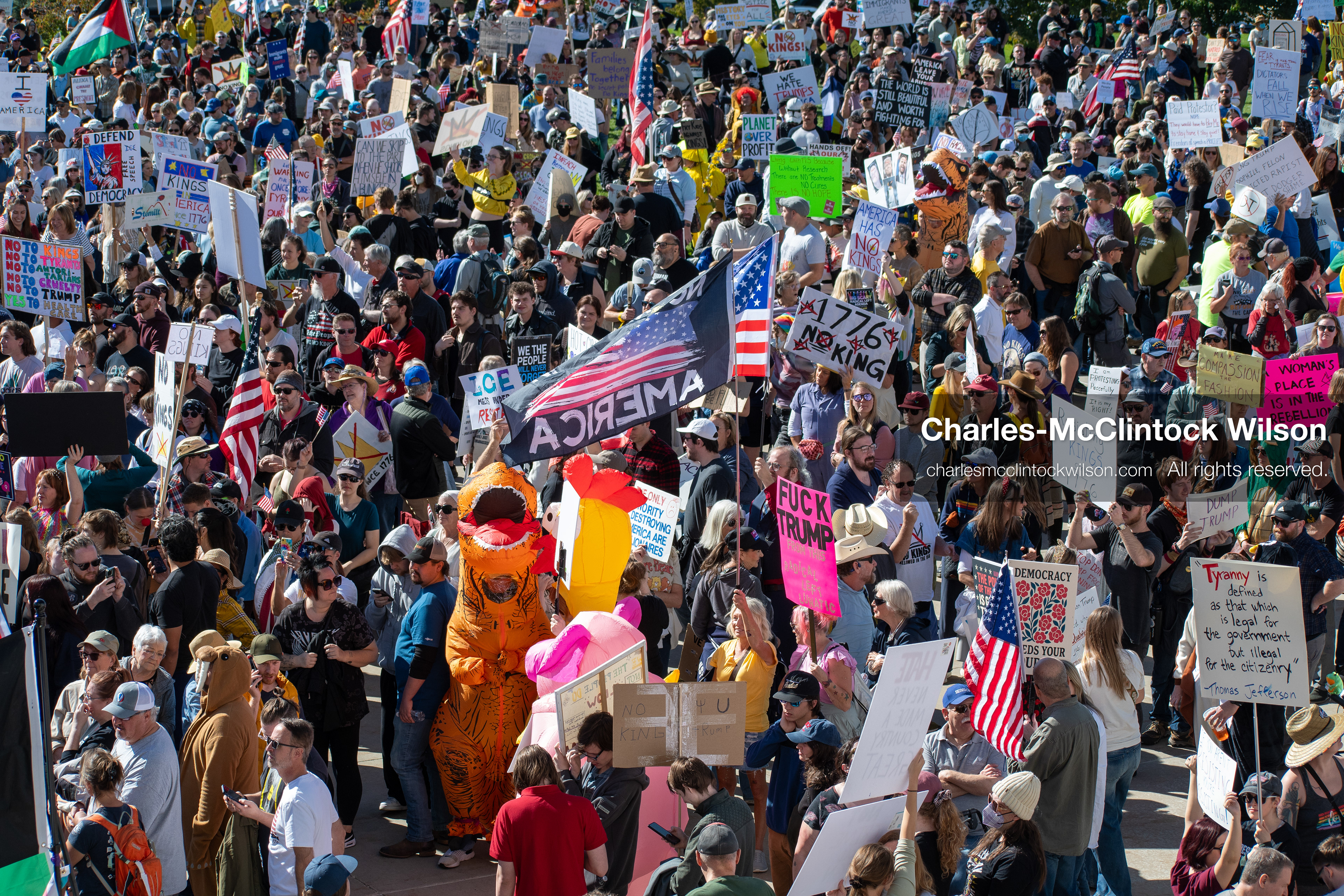 October 18, 2025, Salt Lake City, Utah, USA: Demonstrators participate in a "No Kings" protest held at the Utah State Capitol. Participants hold signs and flags during the public gathering.