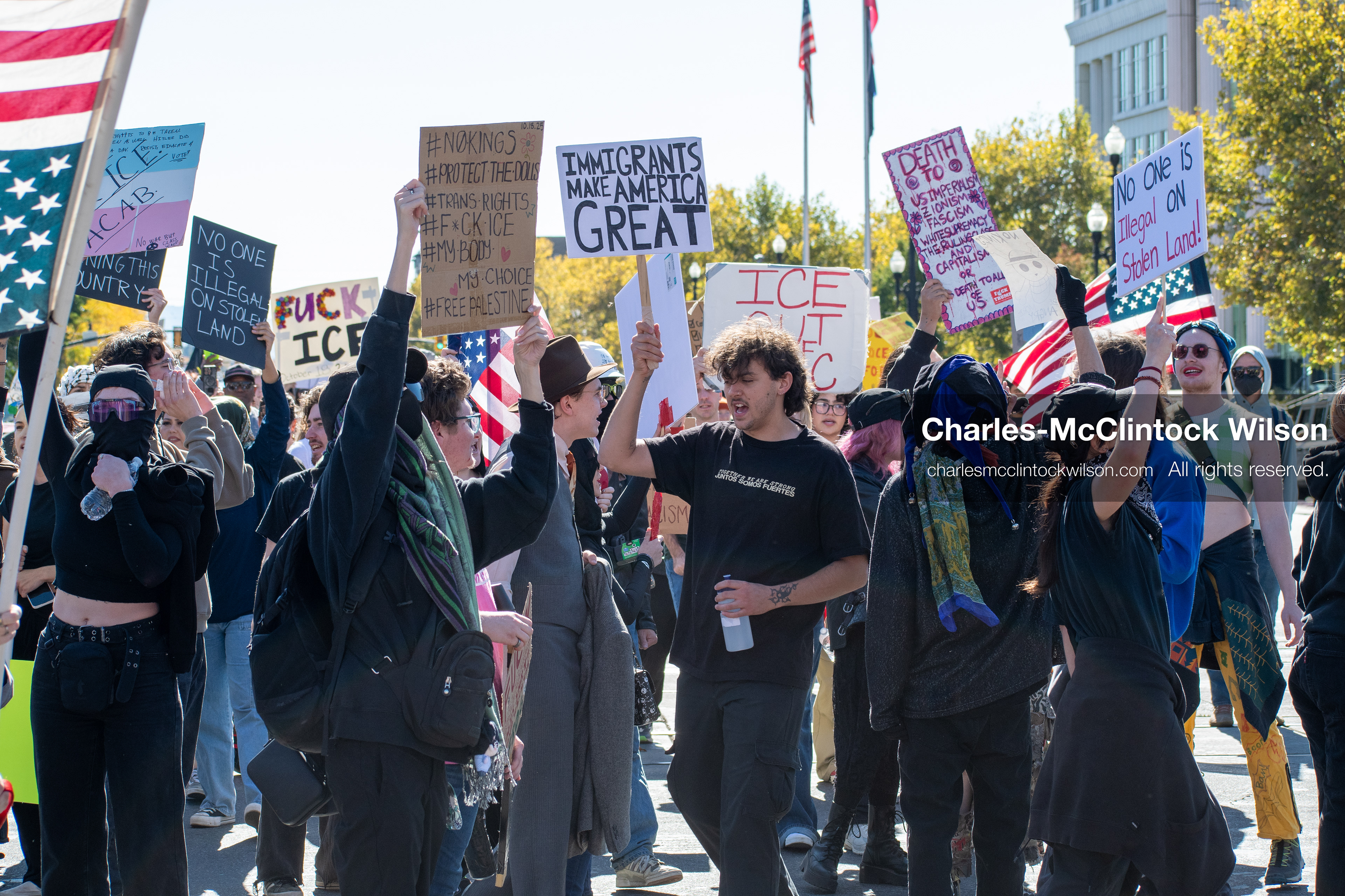 October 18, 2025, Salt Lake City, Utah, USA: Demonstrators march along South State Street during a "No Kings" protest in Salt Lake City, Utah. The protest was part of a nationwide mobilization.