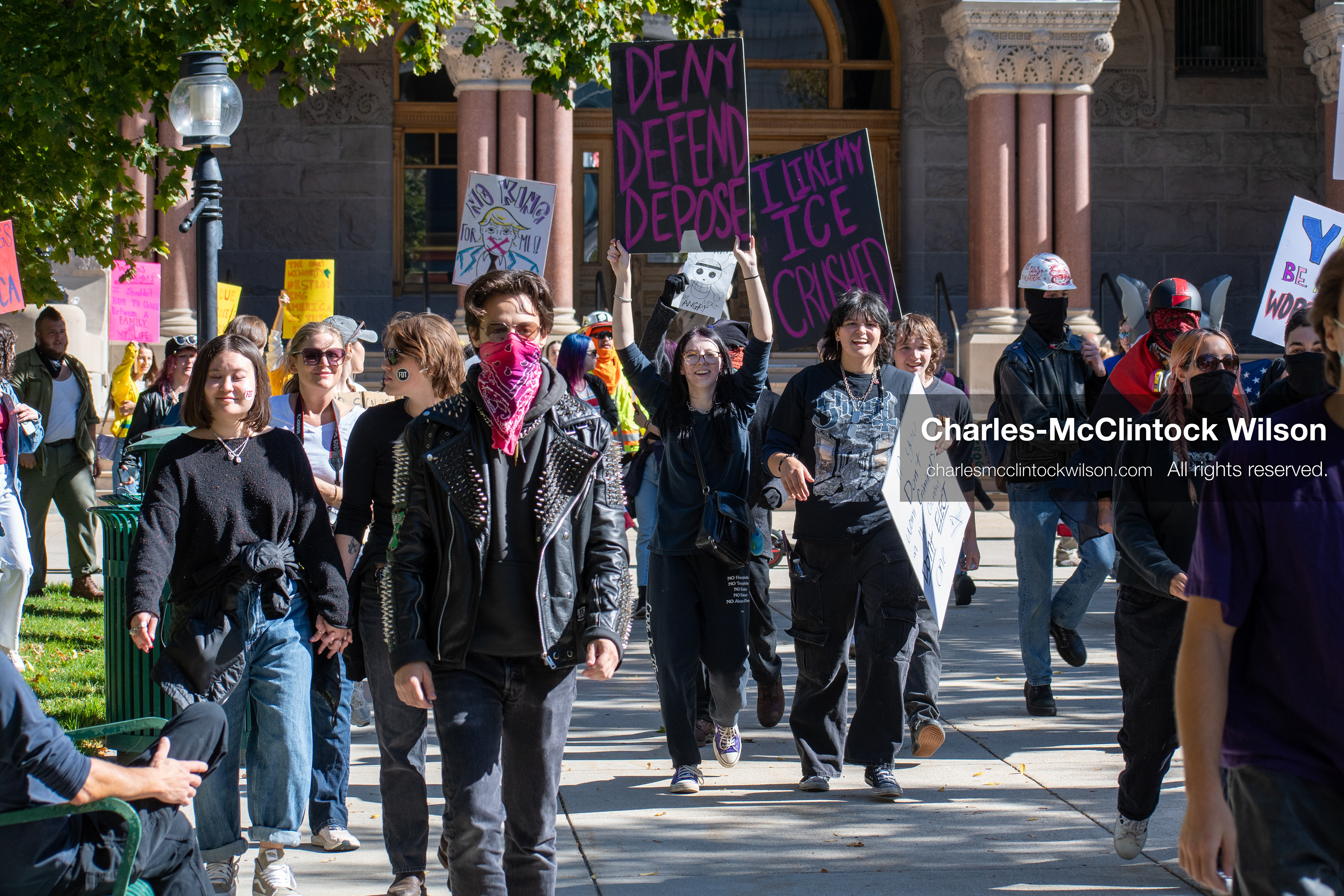 October 18, 2025, Salt Lake City, Utah, USA: Demonstrators march along South State Street during a "No Kings" protest in Salt Lake City, Utah. The protest was part of a nationwide mobilization.