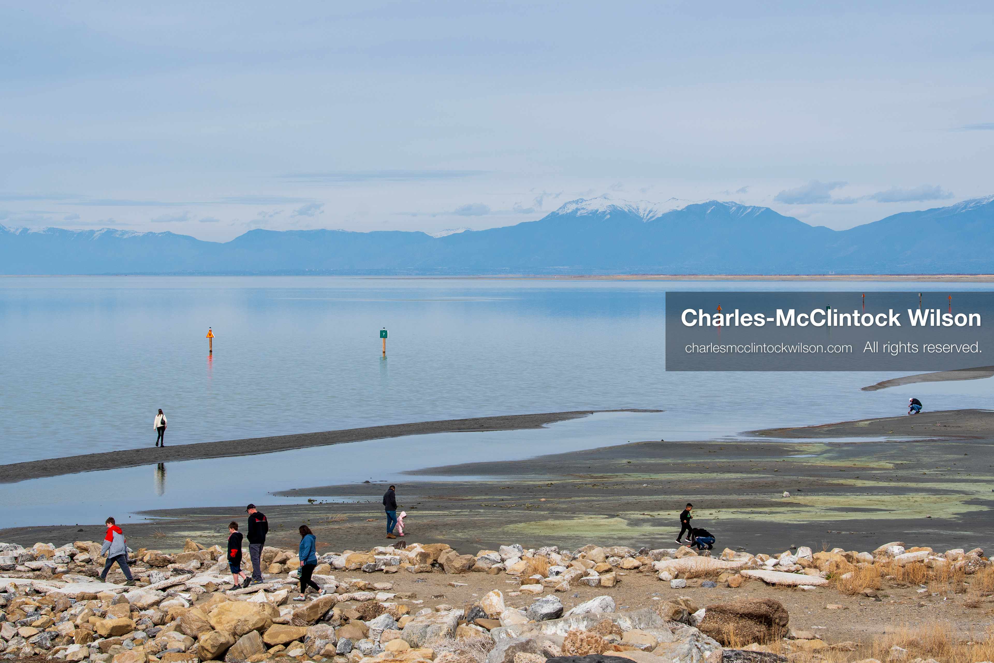 March 1, 2026, Great Salt Lake, Utah, USA: People walk along the shoreline of the Great Salt Lake as water levels remain historically low. Reports from state officials and the Great Salt Lake Strike Team state that the lake continues to fall within a serious adverse‑effects range, with elevations among the lowest recorded in more than one hundred years. The lake has drawn increased public attention as lawmakers consider large‑scale water projects and long‑term plans to address declining conditions. (Credit Image: © Charles‑McClintock Wilson/ZUMA Press Wire)