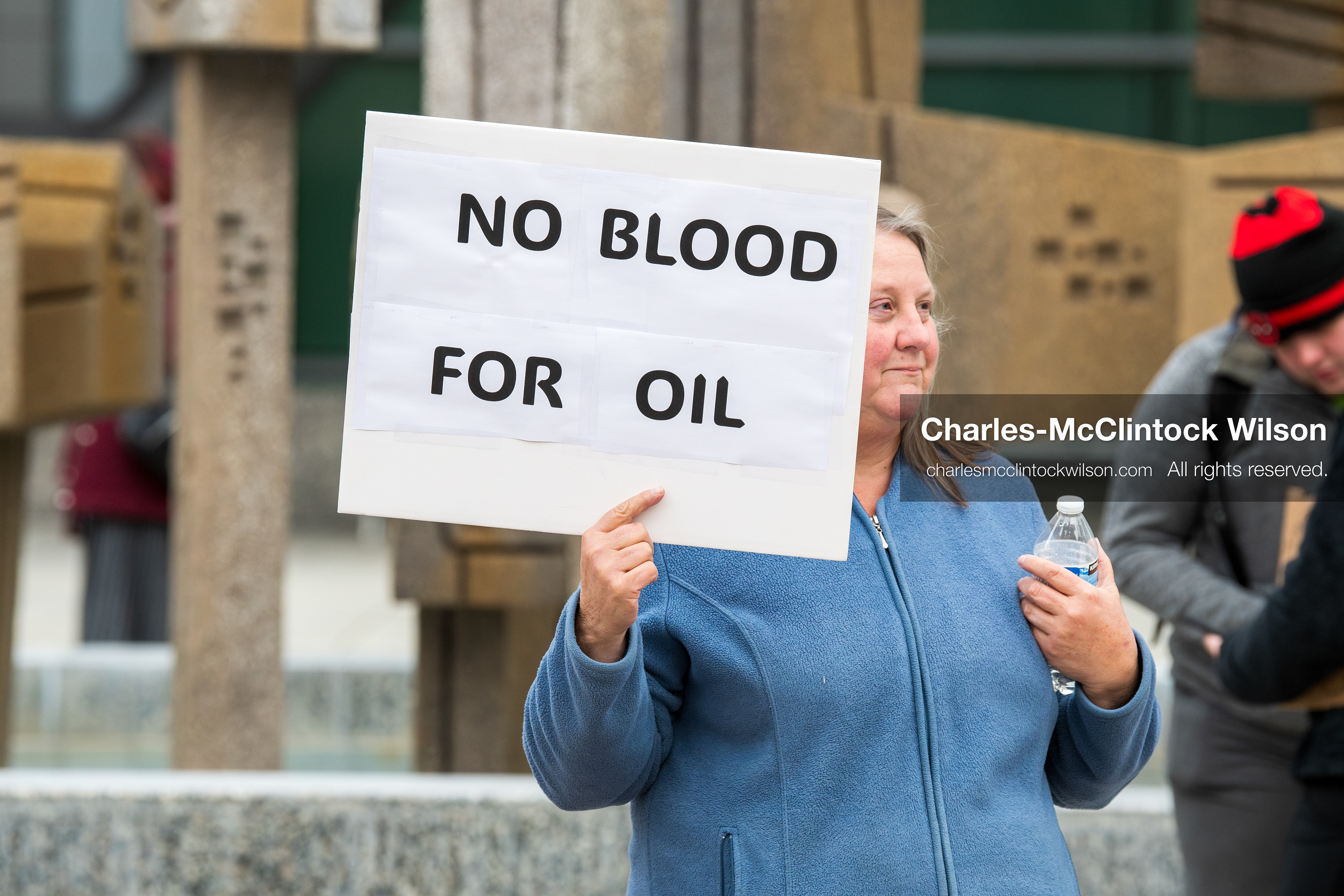 January 3, 2026, Salt Lake City, Utah, USA: A protester holds a sign during a demonstration against US action in Venezuela outside the Wallace Federal Building in Salt Lake City, Utah. The protest was part of a nationwide mobilization responding to recent military developments. (Credit Image: (c) Charles‑McClintock Wilson/ZUMA Press Wire)
