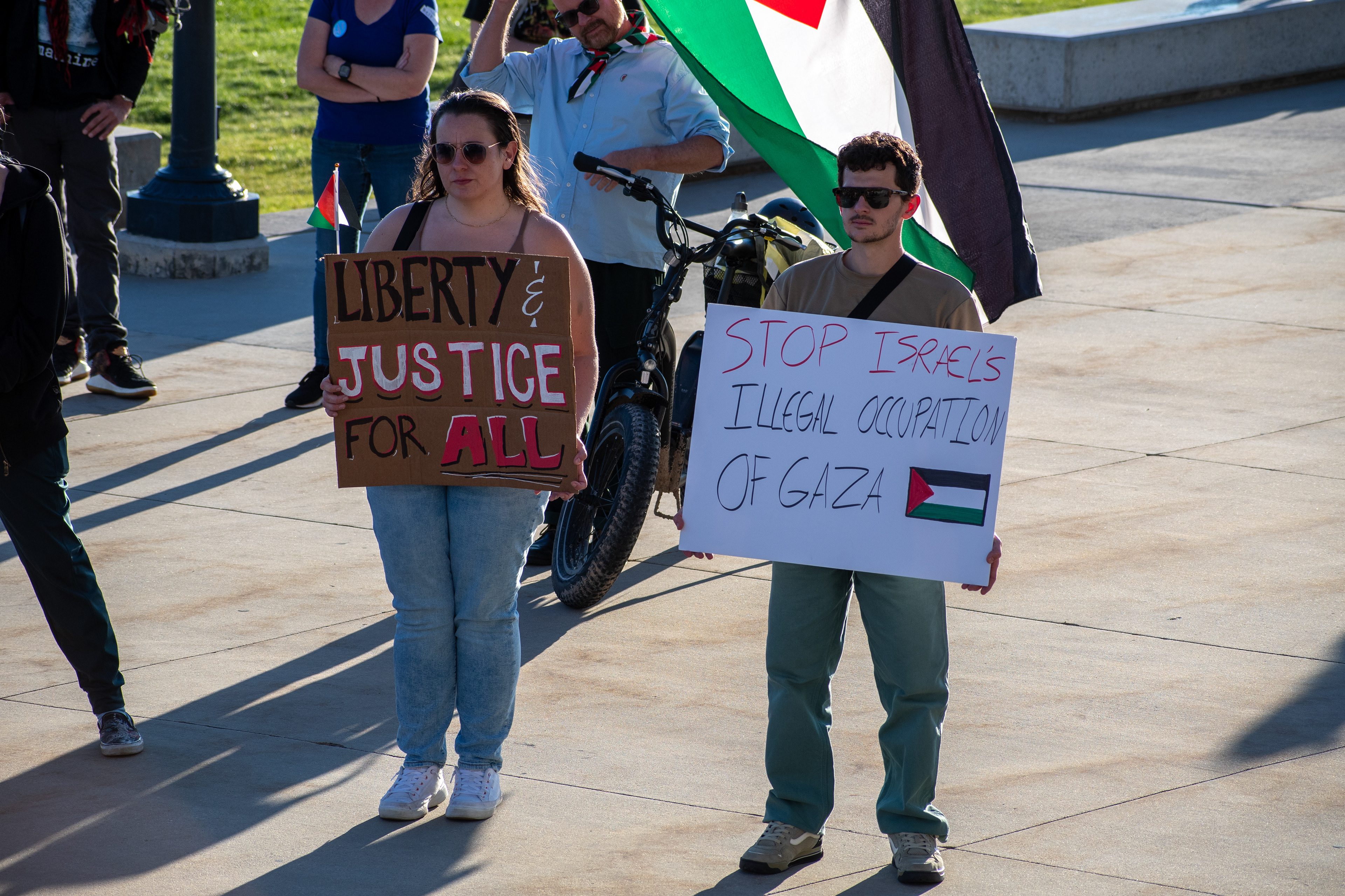 October 10, 2025, Salt Lake City, Utah, USA: Demonstrators hold signs during the Free Palestine Rally organized in front of the Utah State Capitol. Messages include â€œLIBERTY & JUSTICE FOR ALLâ€ and â€œSTOP ISRAEL'S ILLEGAL OCCUPATION OF GAZA,â€ as participants gather in support of Palestinian rights. (Credit Image: © Charles-McClintock Wilson/ZUMA Press Wire)