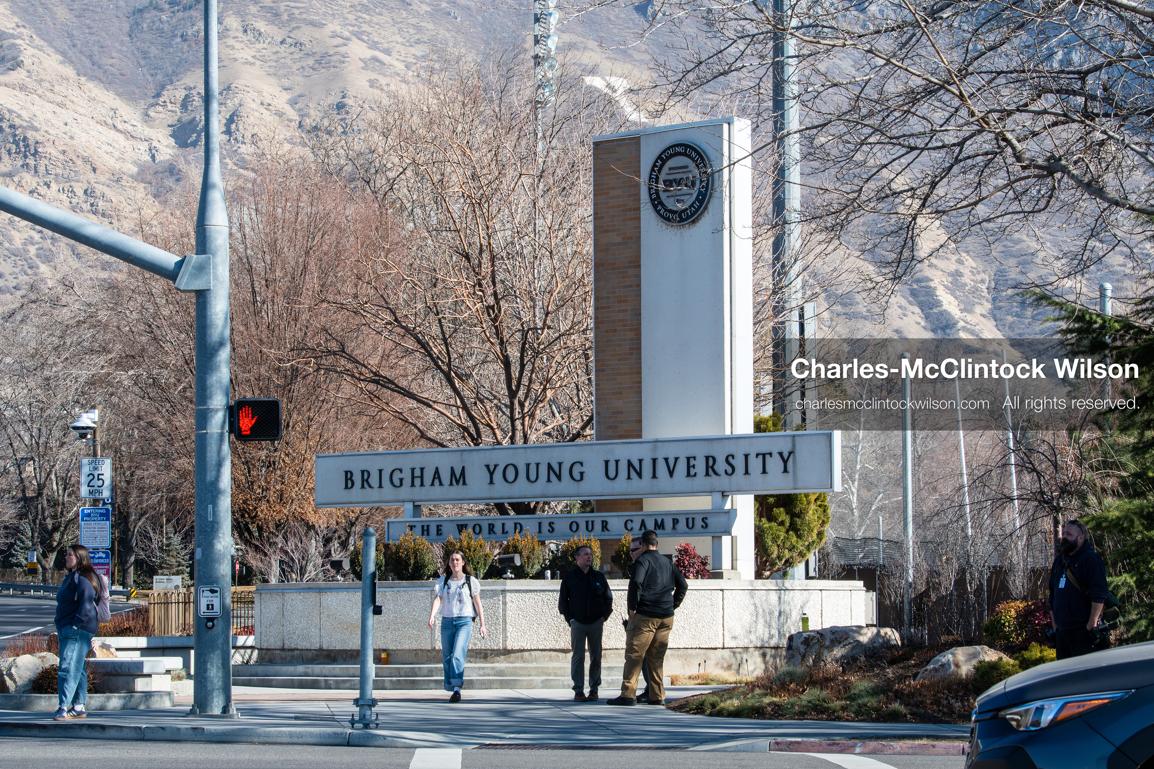 February 5, 2026, Provo, Utah, USA: People stand near an entrance sign at Brigham Young University in Provo during a protest opposing the presence of US Customs and Border Protection recruiters at a career fair held at the university. (Credit Image: © Charles McClintock Wilson/ZUMA Press Wire)
