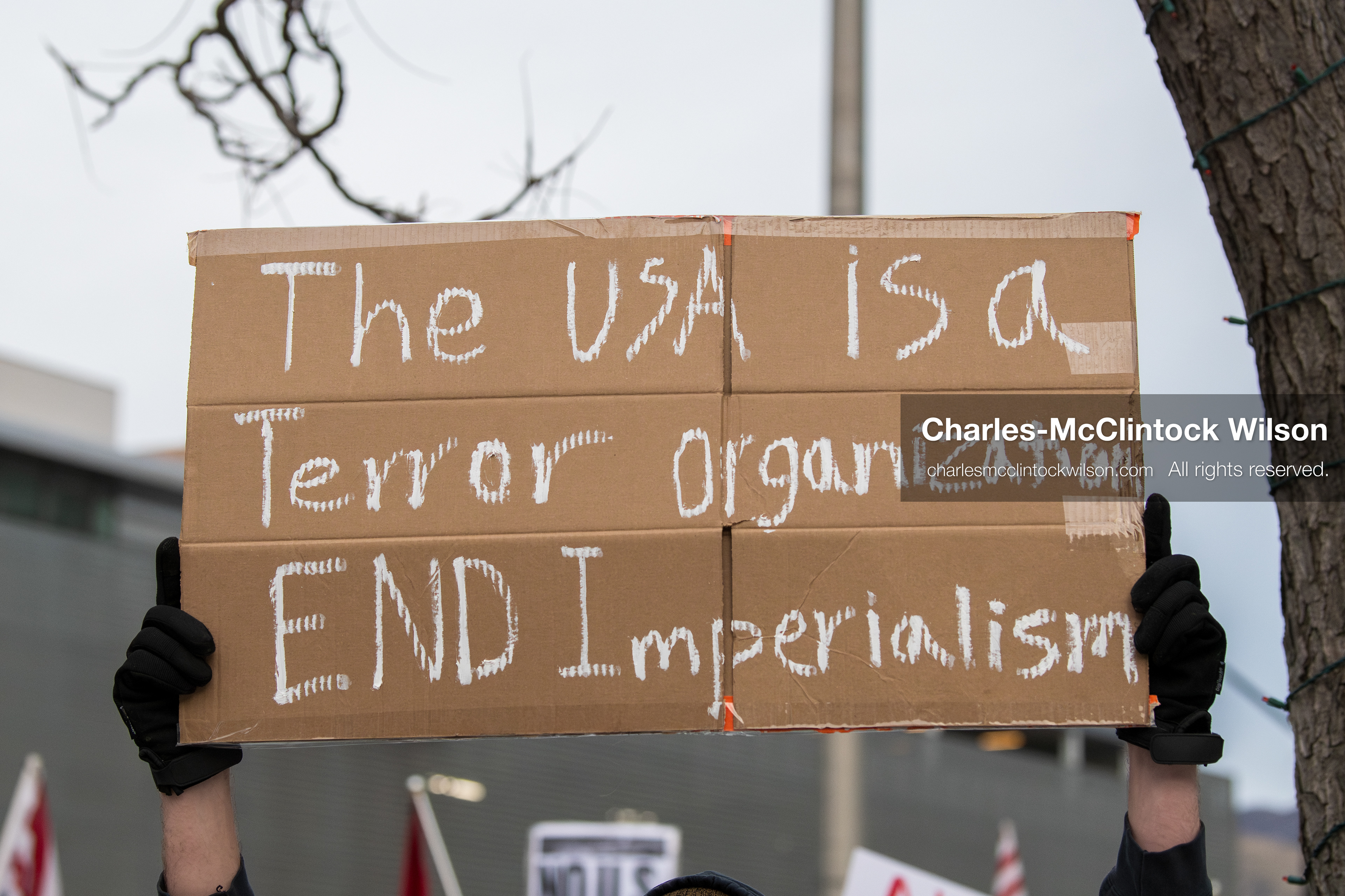 January 3, 2026, Salt Lake City, Utah, USA: A protester holds a sign during a demonstration against US action in Venezuela outside the Wallace Federal Building in Salt Lake City, Utah. The protest was part of a nationwide mobilization responding to recent military developments. (Credit Image: (c) Charles‑McClintock Wilson/ZUMA Press Wire)