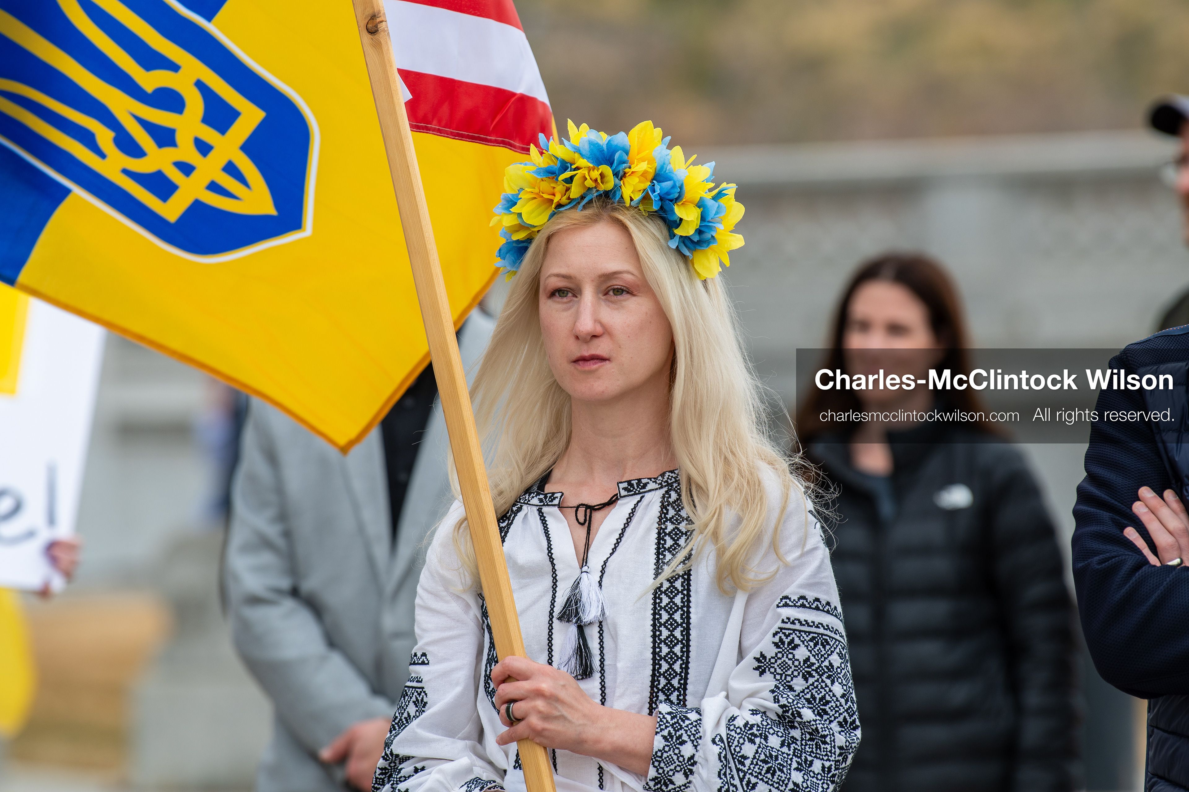 February 28, 2026, Salt Lake City, Utah, USA: A woman wearing a traditional Ukrainian embroidered blouse and a blue and yellow flower wreath holds a Ukrainian flag during the Stand With Ukraine rally near the Utah State Capitol. The gathering marked the four year anniversary of the full scale Russian invasion of Ukraine and brought community members together in support of Ukrainians and local humanitarian efforts. (Credit Image: © Charles McClintock Wilson/ZUMA Press Wire)