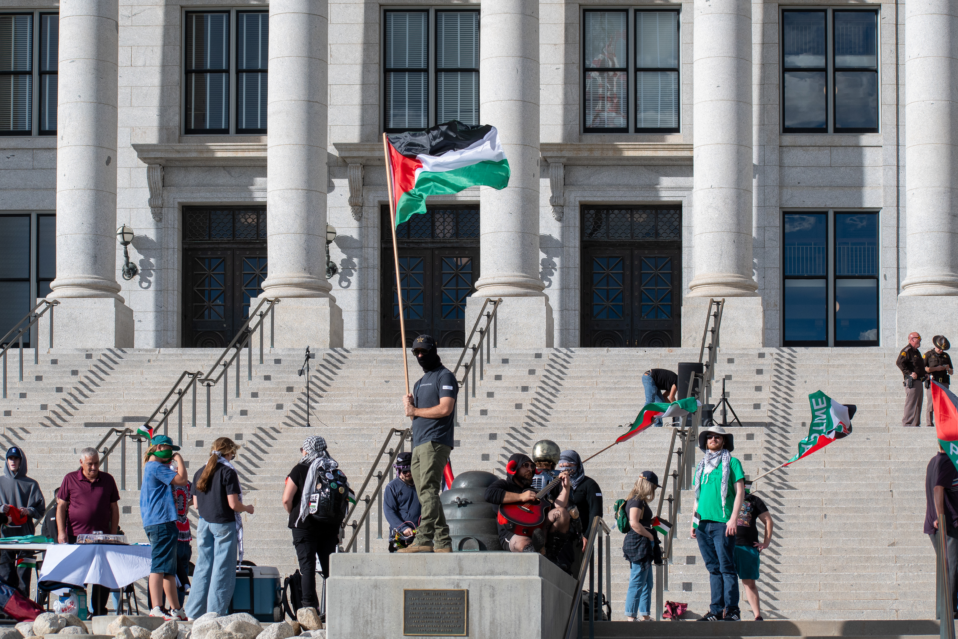October 10, 2025, Salt Lake City, Utah, USA: Pro-Palestine demonstrators gather in front of the Utah State Capitol during the Free Palestine Rally. Participants hold flags and signs as part of the public demonstration. (Credit Image: © Charles-McClintock Wilson/ZUMA Press Wire)