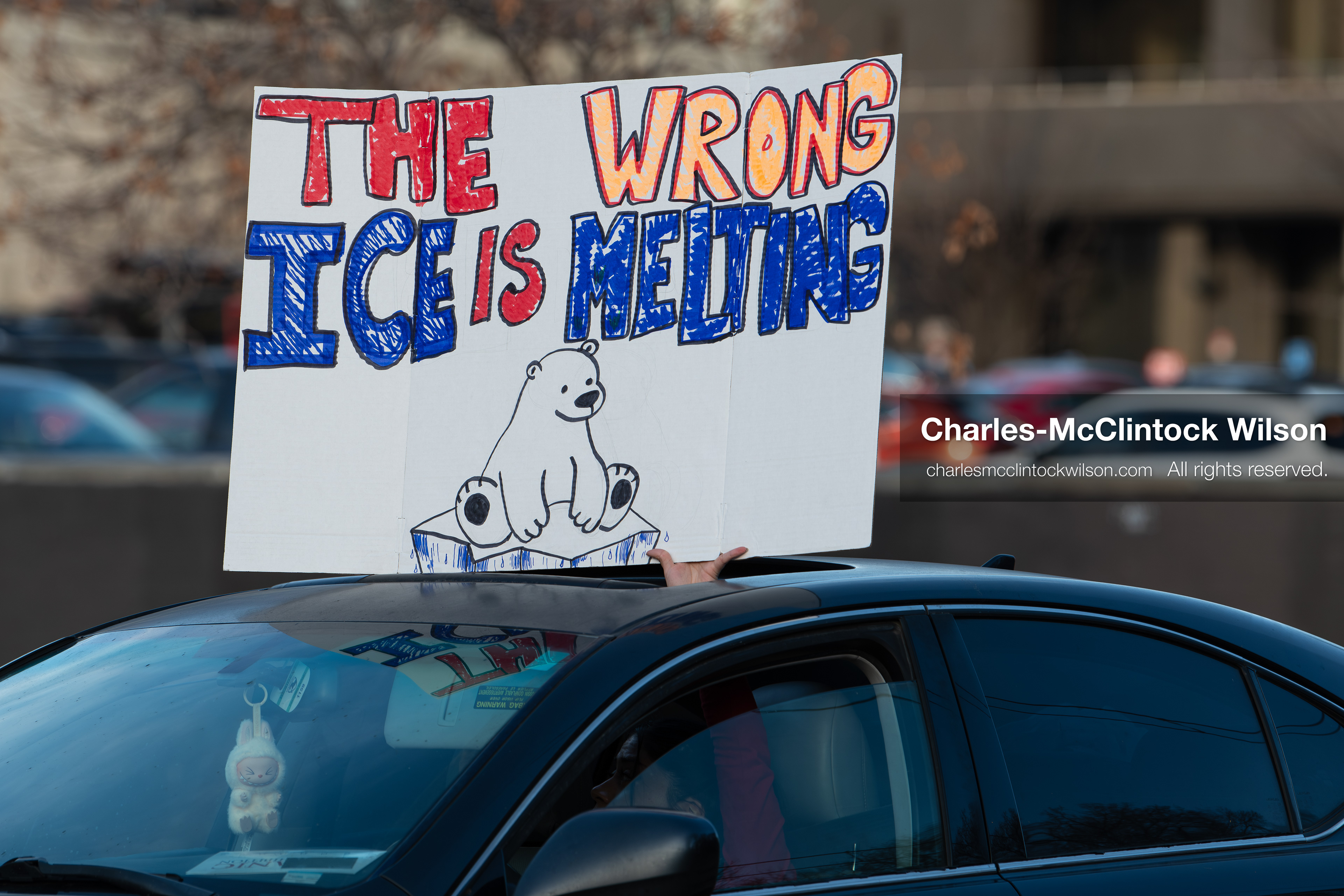 January 30, 2026, Salt Lake City, Utah, USA: A demonstrator displays a protest sign from a vehicle during an anti‑ICE protest in Salt Lake City, part of a nationwide response to immigration enforcement policies. (Credit Image: © Charles‑McClintock Wilson/ZUMA Press Wire)