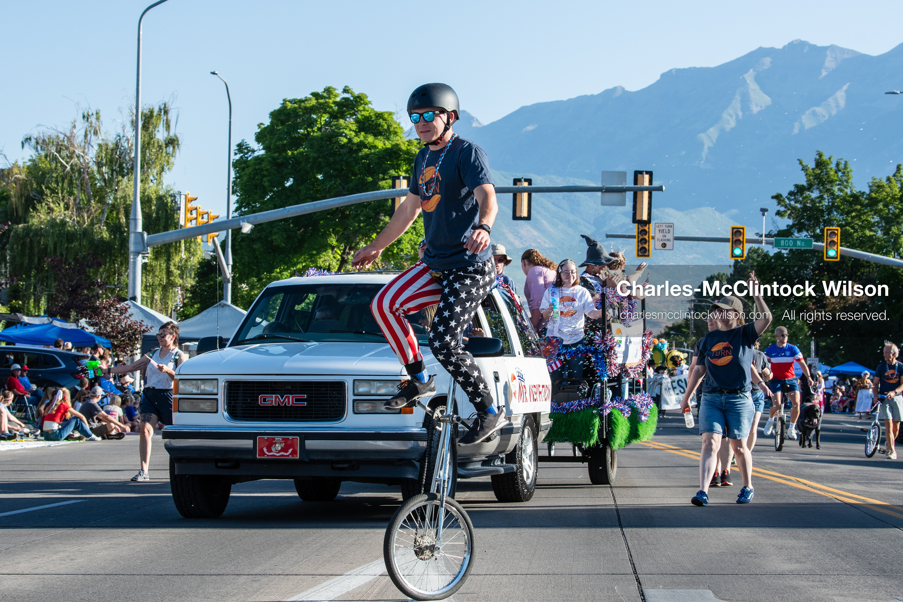 July 4, 2026, Provo, Utah, USA: A performer riding a tall unicycle and wearing patriotic pants moves down the street as part of a procession during America's Freedom Festival Grand Parade in Provo, Utah, Saturday, July 4, 2026. The annual Independence Day event features expanded programming to honor the 250th anniversary of United States independence. (Credit Image: © Charles-McClintock Wilson/ZUMA Press Wire)