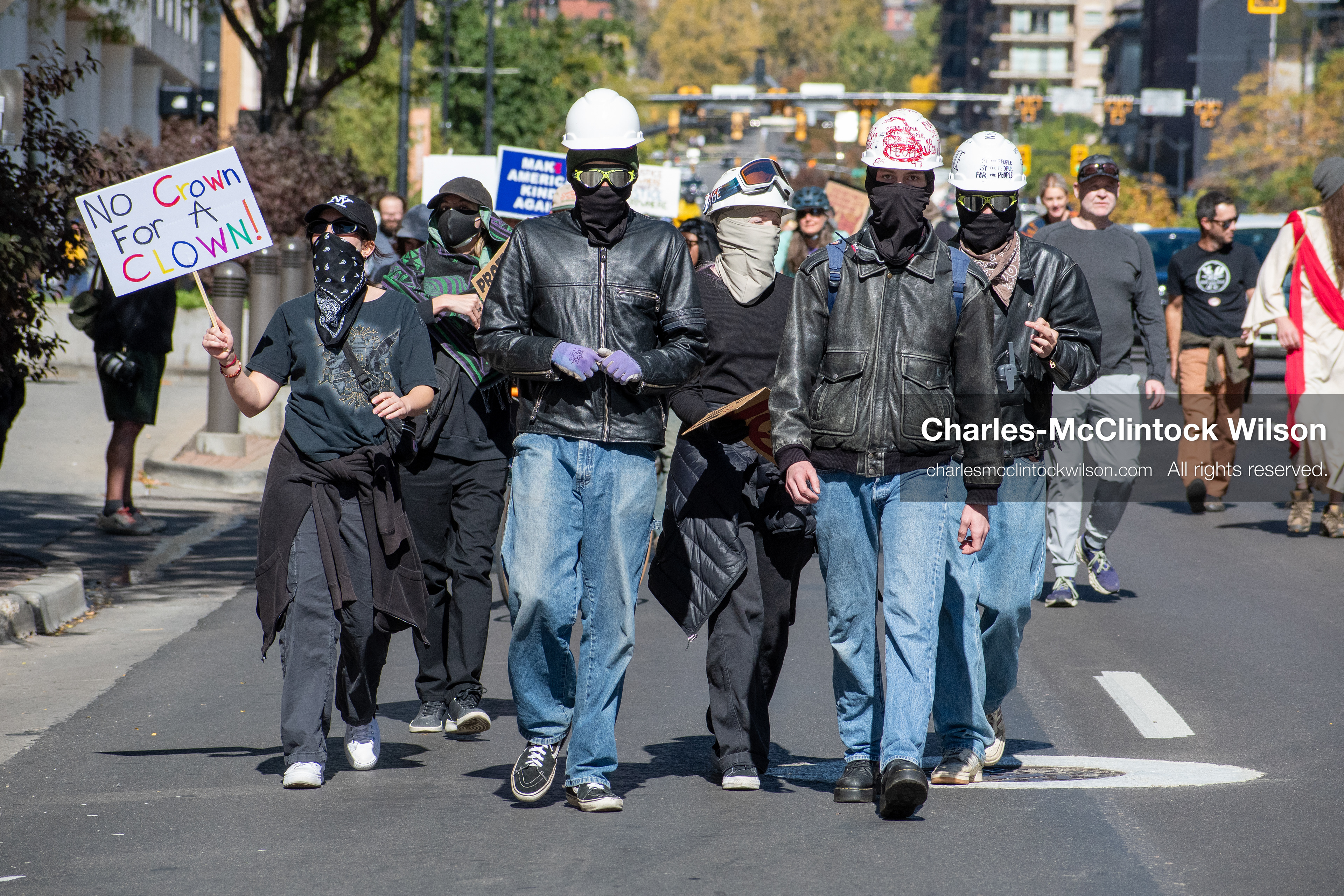 October 18, 2025, Salt Lake City, Utah, USA: Demonstrators march along South State Street during a "No Kings" protest in Salt Lake City, Utah. The protest was part of a nationwide mobilization.