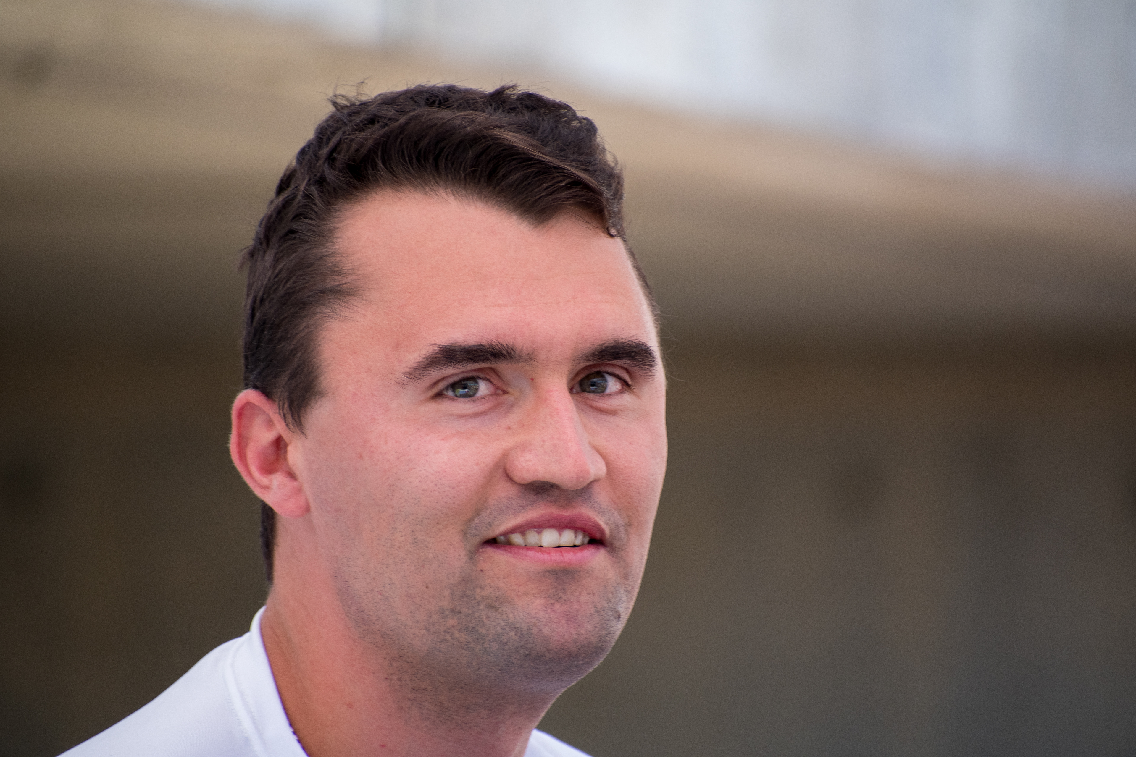 OREM, UTAH – SEPTEMBER 10, 2025: Charlie Kirk reacts during a public appearance at Utah Valley University, where he addressed supporters and engaged with attendees in the UVU Courtyard. Captured mid-expression, Kirk looks directly at the camera as media crews and onlookers gather around him. The image reflects the immediacy and intensity of his final public engagement before the shooting incident that disrupted the event. © Charles-McClintock Wilson / ZUMA Press