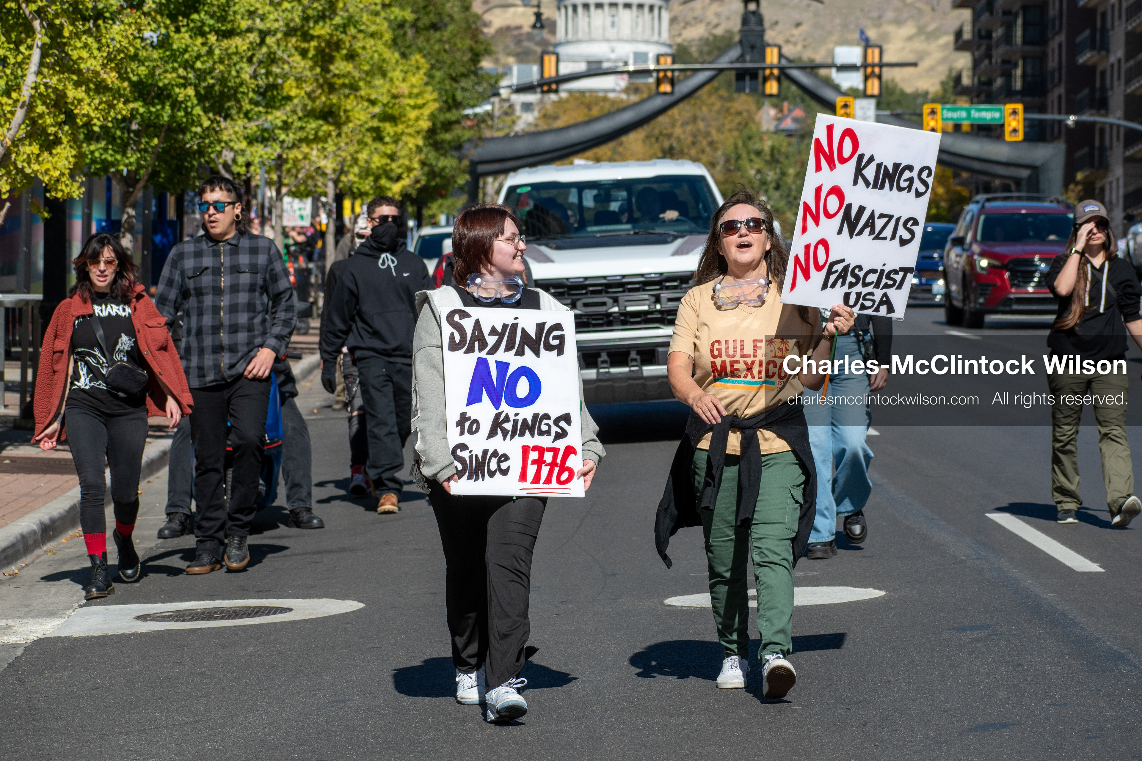 October 18, 2025, Salt Lake City, Utah, USA: Demonstrators march along South State Street during a "No Kings" protest in Salt Lake City, Utah. The protest was part of a nationwide mobilization.