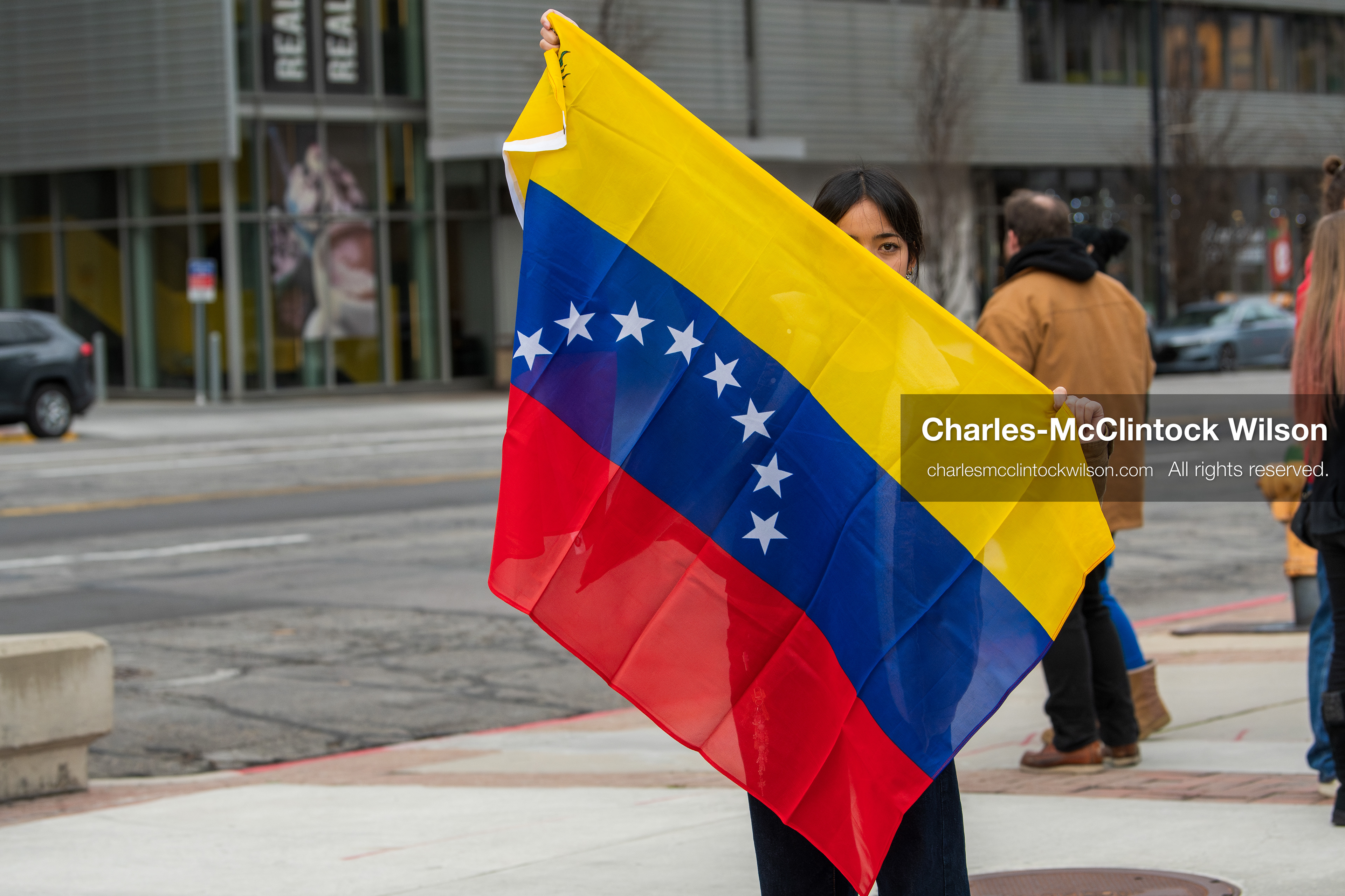 January 3, 2026, Salt Lake City, Utah, USA: A protester holds a Venezuelan flag during a demonstration against US action in Venezuela outside the Wallace Federal Building in Salt Lake City, Utah. The protest was part of a nationwide mobilization responding to recent military developments. (Credit Image: (c) Charles‑McClintock Wilson/ZUMA Press Wire)