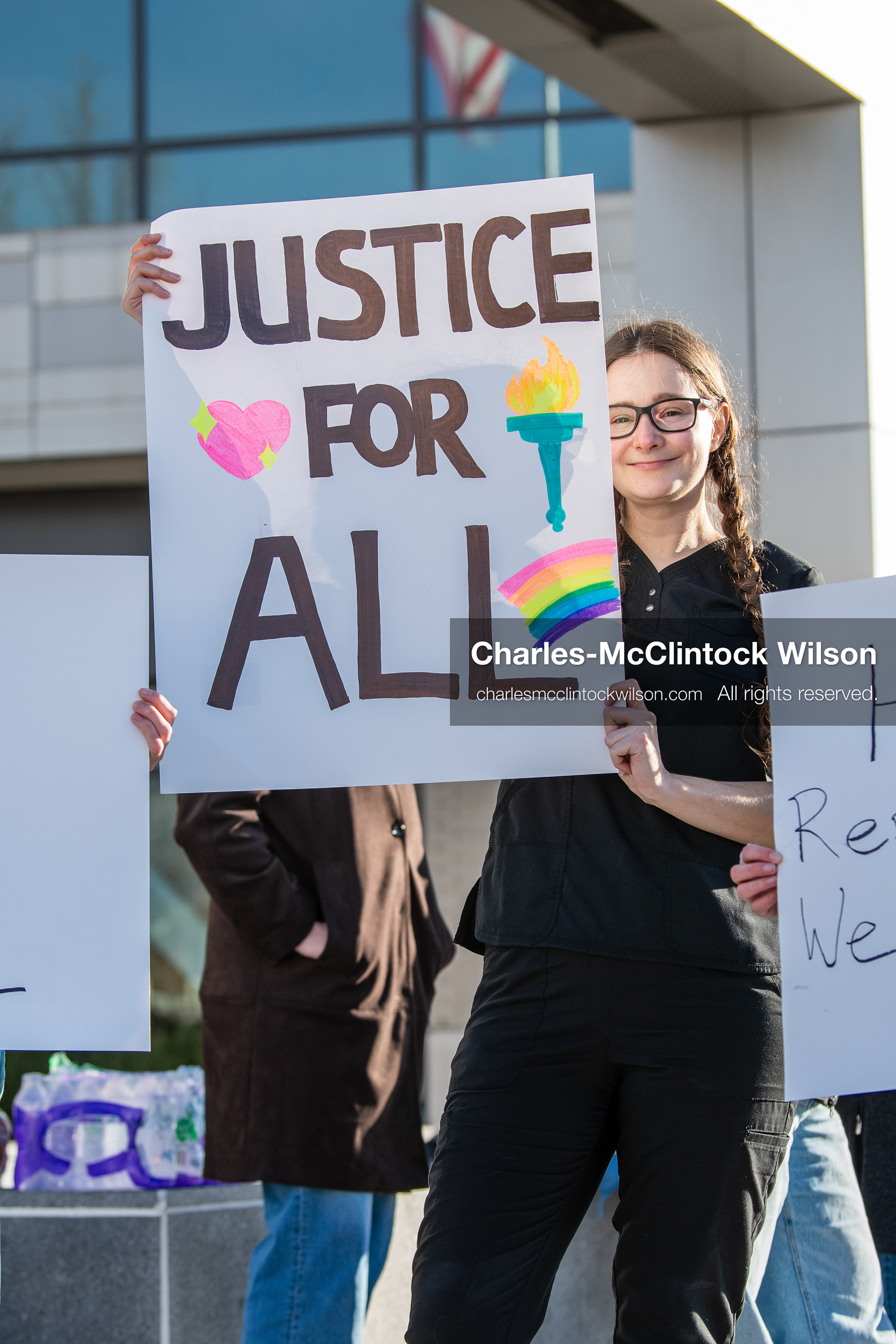 January 20, 2026, Provo, Utah, USA: A demonstrator stands outside Provo City Hall during the Free America Walkout protest in Provo Utah on January 20 2026. The nationwide event called for immigration reform and changes to detention practices. 