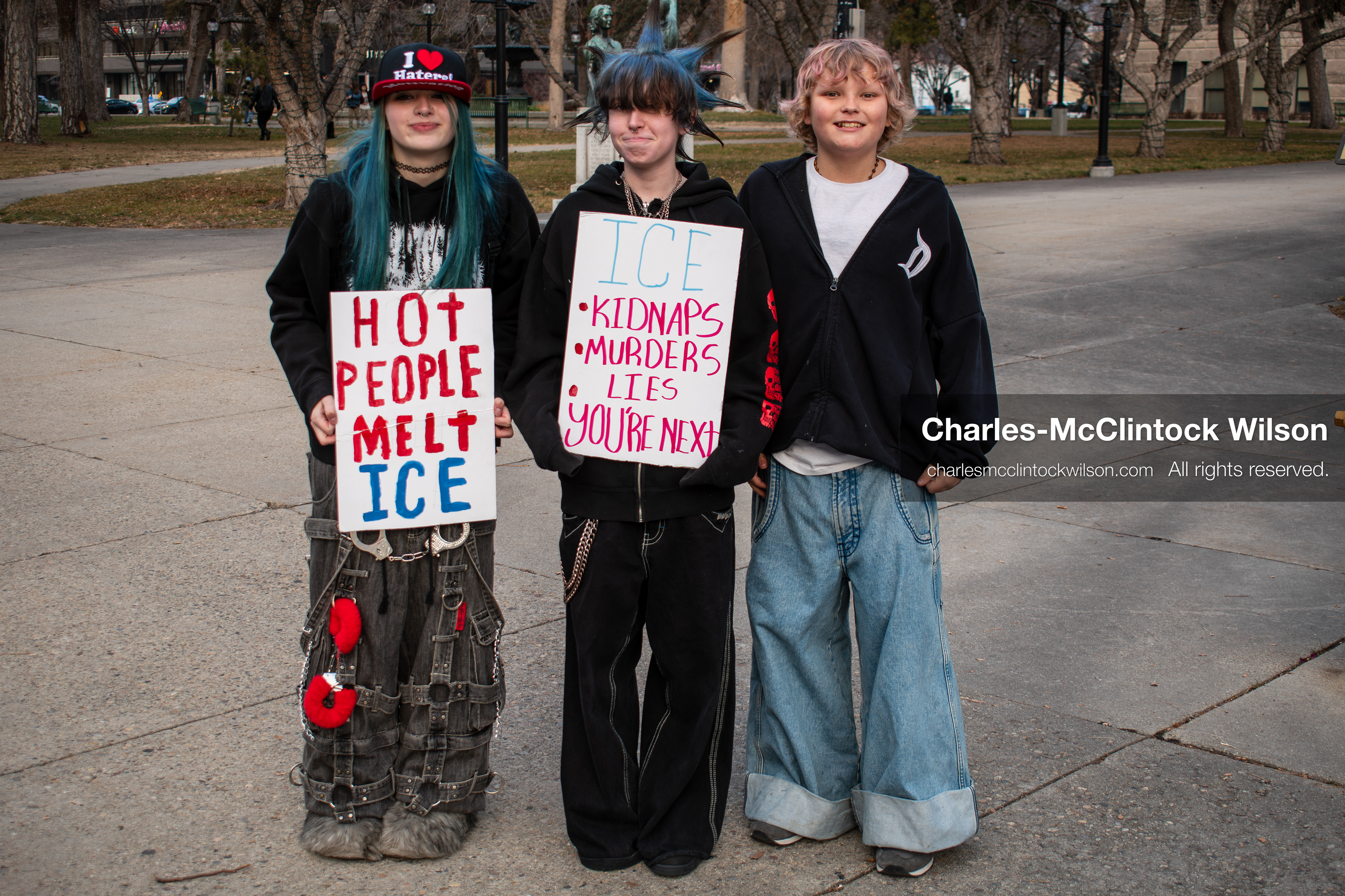 January 30, 2026, Salt Lake City, Utah, USA: Three young demonstrators stand on a paved plaza during an anti‑ICE protest in Salt Lake City, part of a nationwide response to immigration enforcement policies. (Credit Image: © Charles‑McClintock Wilson/ZUMA Press Wire)