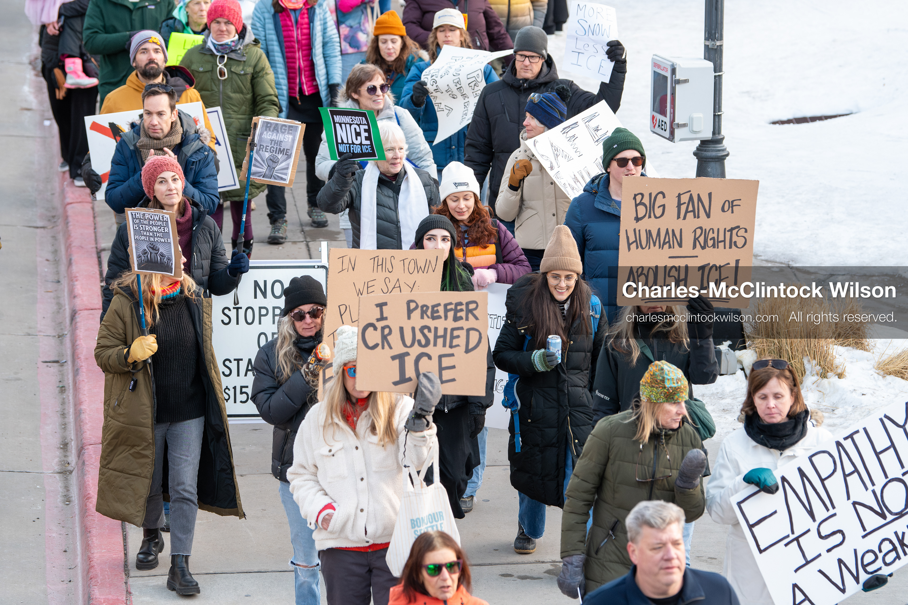 January 26, 2026, Park City, Utah, USA: Demonstrators march through Main Street holding signs during a protest opposing U.S. Immigration and Customs Enforcement (I.C.E.) ICE agents at the Sundance Film Festival in Park City, Utah, on Monday, Jan. 26, 2026. The event was held in response to the fatal shooting of Alex Pretti by a U.S. Border Patrol officer in Minneapolis. (Credit Image: © Charles McClintock Wilson/ZUMA Press Wire)