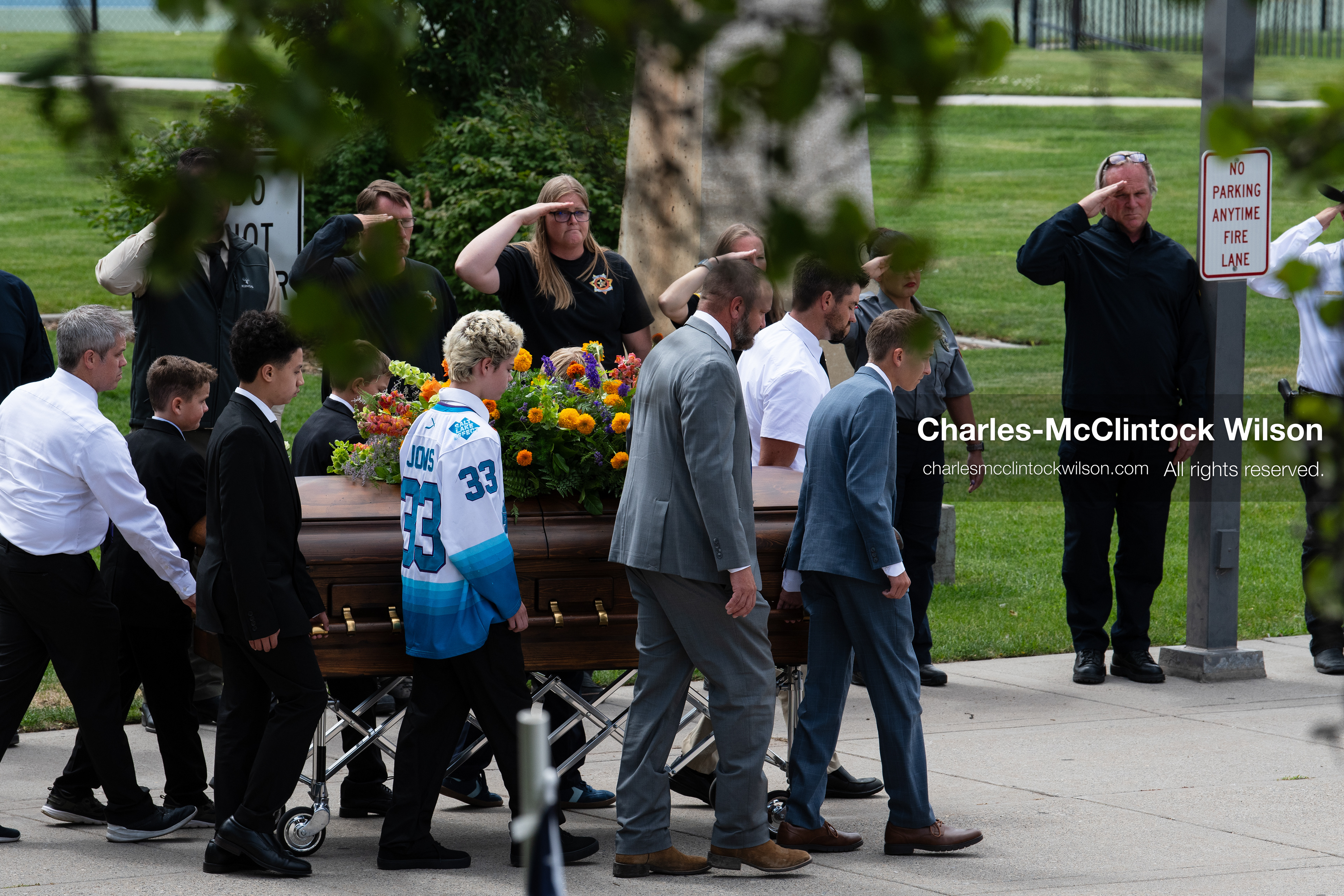 Pallbearers and family members escort the casket of a Long family member outside the UCCU Center at Utah Valley University in Orem, Utah, on Wednesday, July 29, 2026. More than 300 people came to the public memorial ceremony to honor Provo Fire Captain Spencer Long, his wife Katrina, and three of their sons, who died after a flash flood hit their campsite near the Sunglow Campground in Wayne County. (Photo by Charles-McClintock Wilson/Sipa USA)