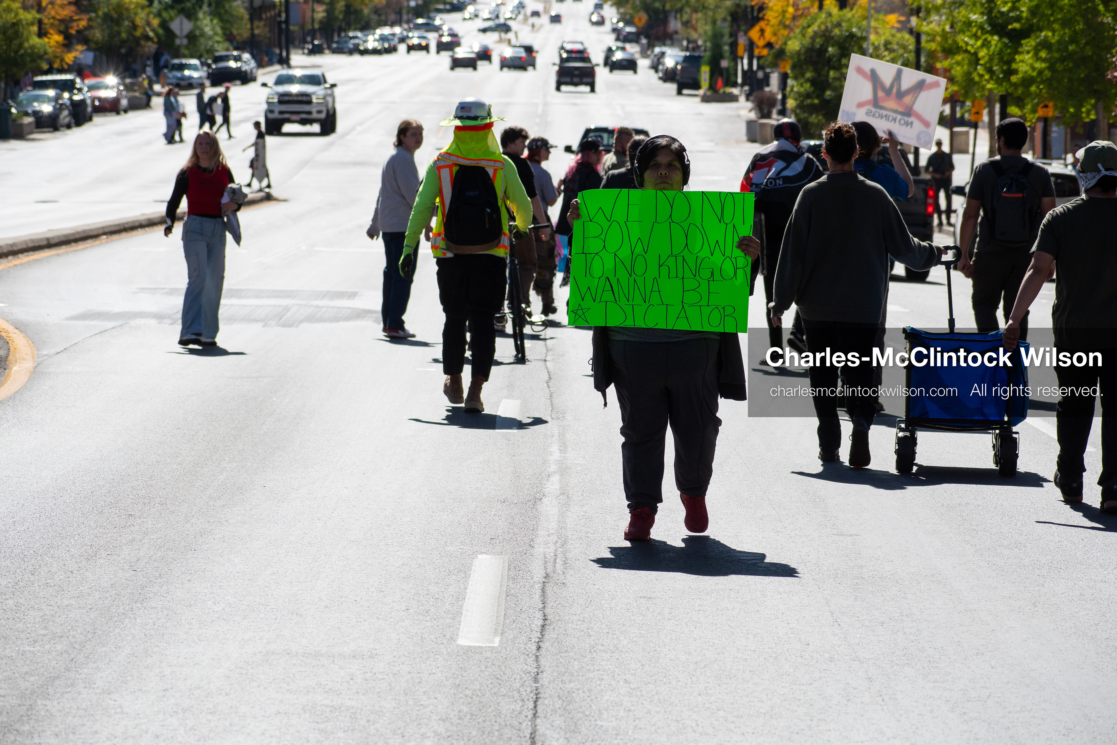 October 18, 2025, Salt Lake City, Utah, USA: Demonstrators march along South State Street during a "No Kings" protest in Salt Lake City, Utah. The protest was part of a nationwide mobilization.