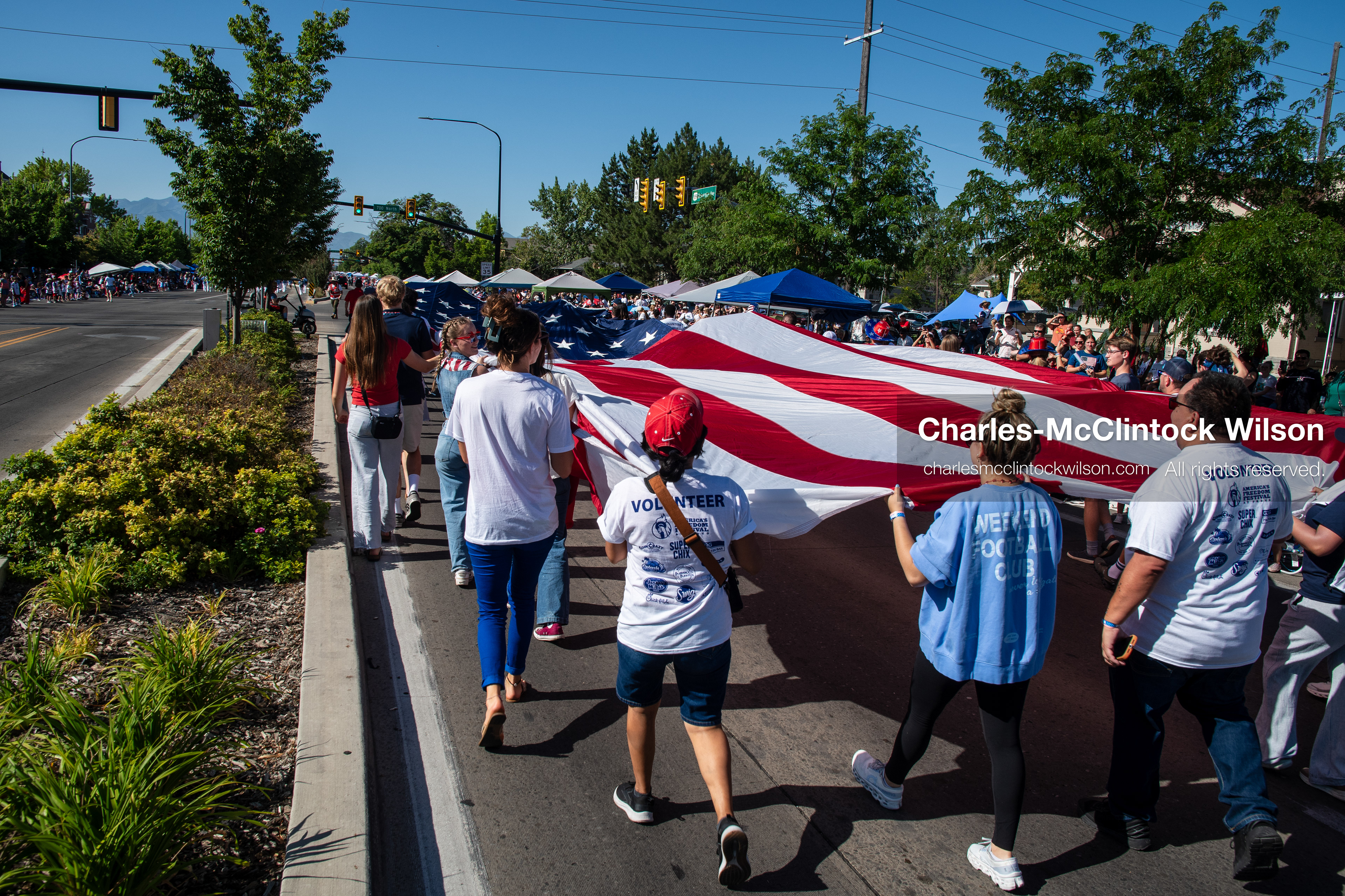 July 4, 2026, Provo, Utah, USA: Volunteers carry a massive American flag horizontally down the street past crowds of spectators during America's Freedom Festival Grand Parade in Provo, Utah, Saturday, July 4, 2026. The annual Independence Day event features expanded programming to honor the 250th anniversary of United States independence. (Credit Image: © Charles-McClintock Wilson/ZUMA Press Wire)