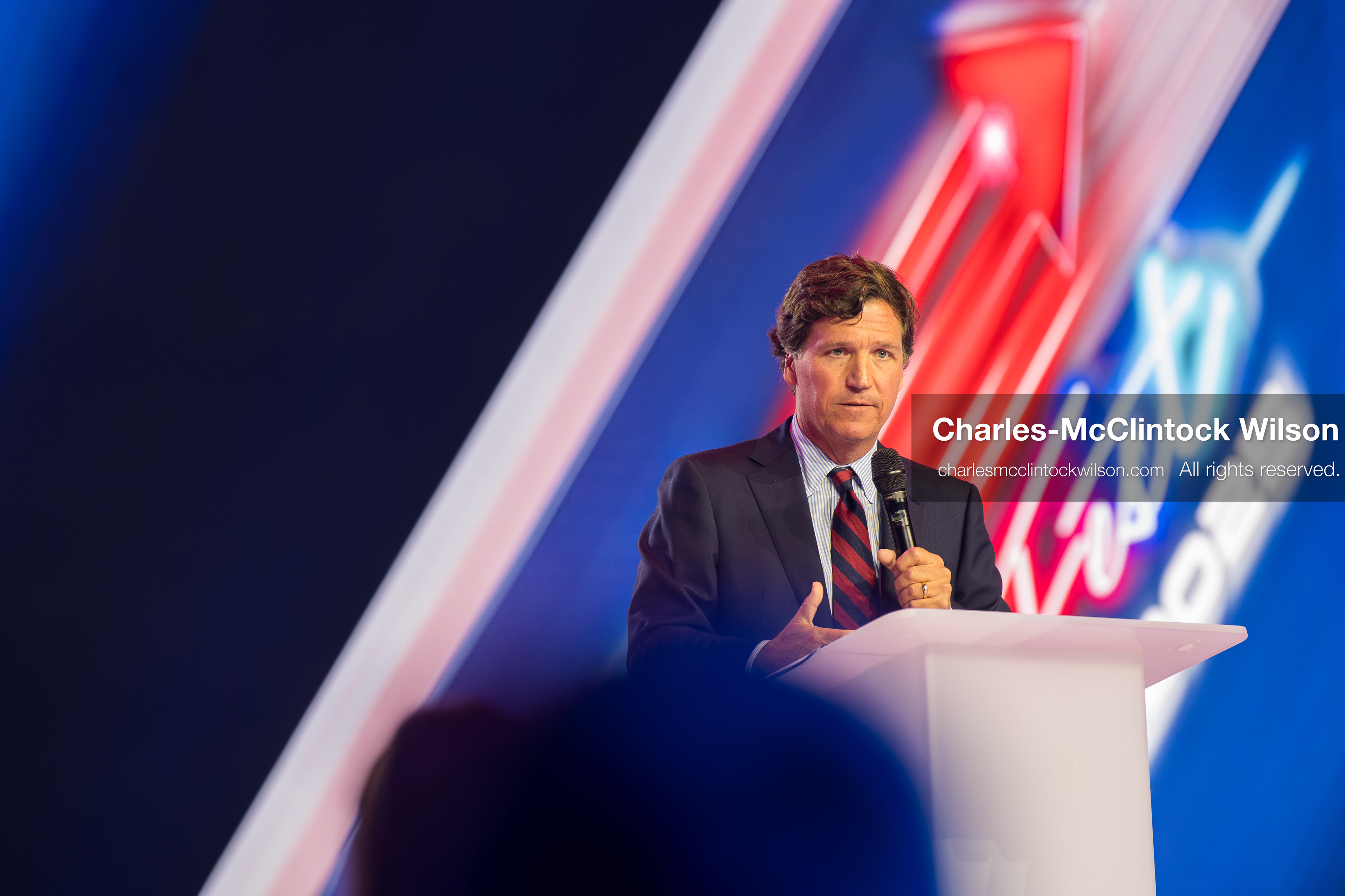 December 18, 2025, Phoenix, Arizona, USA: Tucker Carlson speaks on Day One of Turning Point USA’s AmericaFest 2025 at the Phoenix Convention Center in Phoenix, Arizona.   (Credit Image: © Charles‑McClintock Wilson/ZUMA Press Wire)
