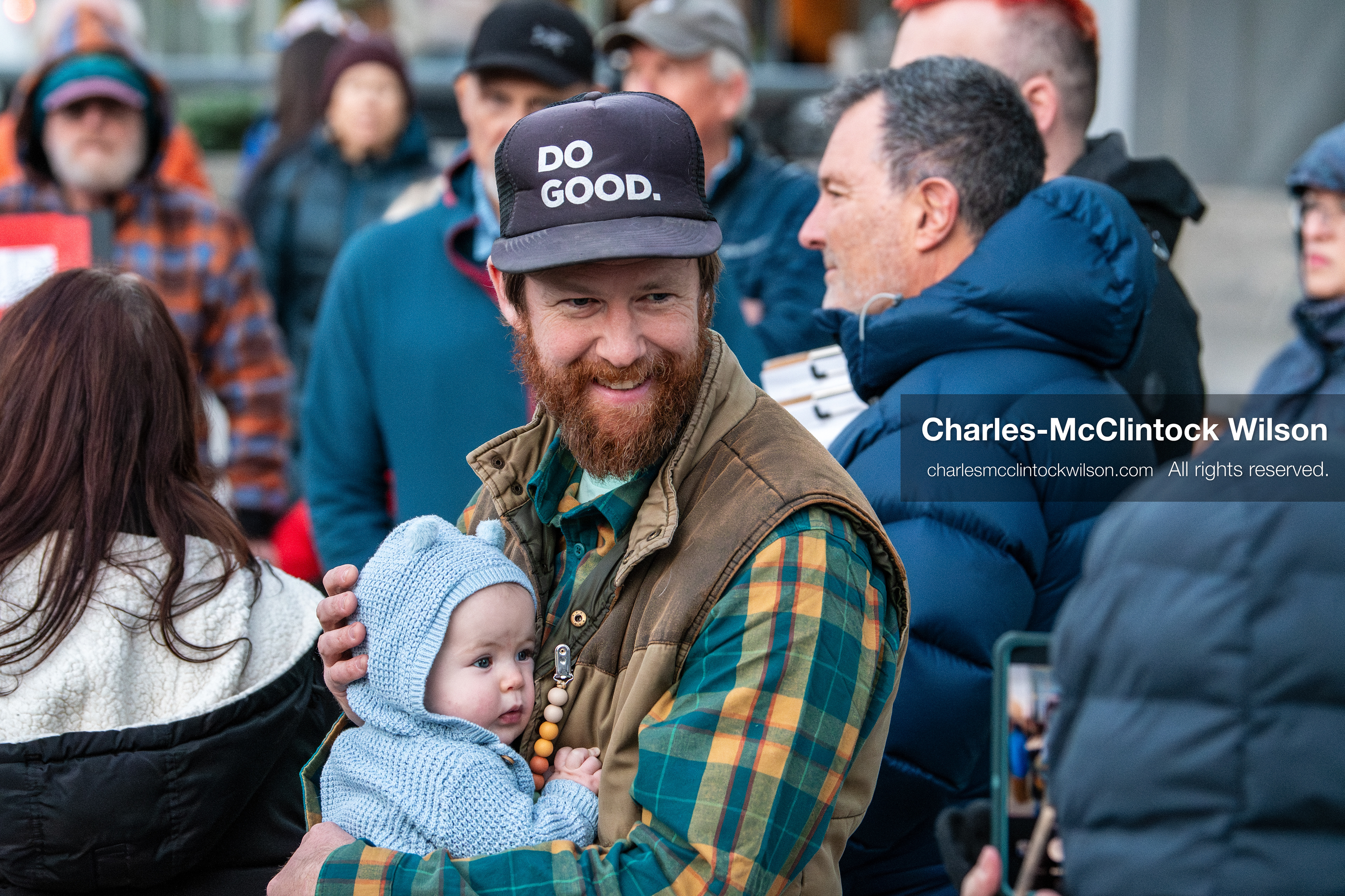 January 5, 2026, Salt Lake City, Utah, USA: A demonstrator holds a baby during a protest outside the Wallace Federal Building in Salt Lake City, Utah. The rally, organized by Salt Lake Indivisible, called for congressional limits on presidential war powers following recent US military actions in Venezuela involving the government of Nicolas Maduro. Attendees signed petitions addressed to Utah US senators Mike Lee and John Curtis. (Credit Image: (c) Charles‑McClintock Wilson/ZUMA Press Wire)