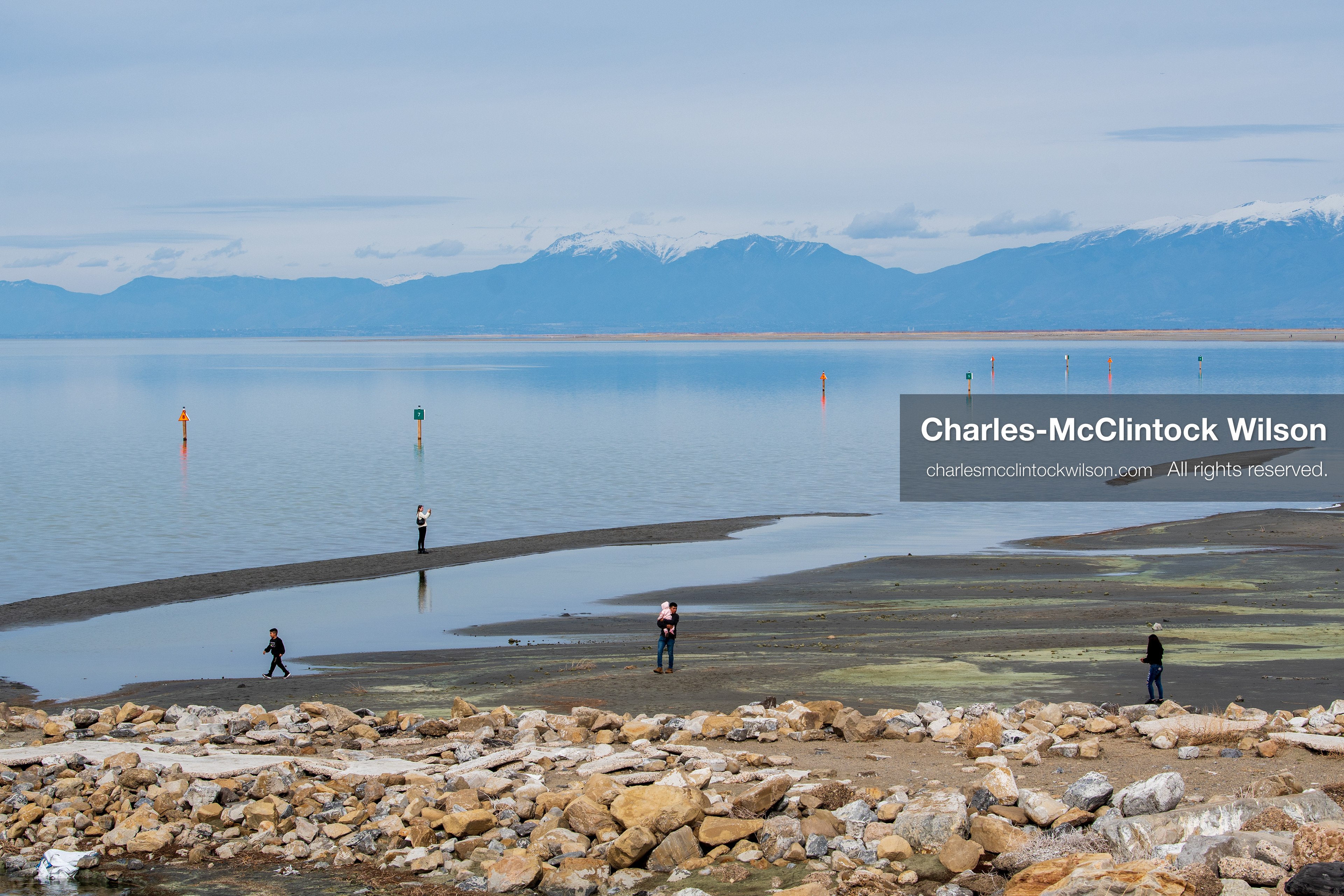 March 1, 2026, Great Salt Lake, Utah, USA: People walk along the shoreline of the Great Salt Lake as water levels remain historically low. Reports from state officials and the Great Salt Lake Strike Team state that the lake continues to fall within a serious adverse‑effects range, with elevations among the lowest recorded in more than one hundred years. The lake has drawn increased public attention as lawmakers consider large‑scale water projects and long‑term plans to address declining conditions. (Credit Image: © Charles‑McClintock Wilson/ZUMA Press Wire)