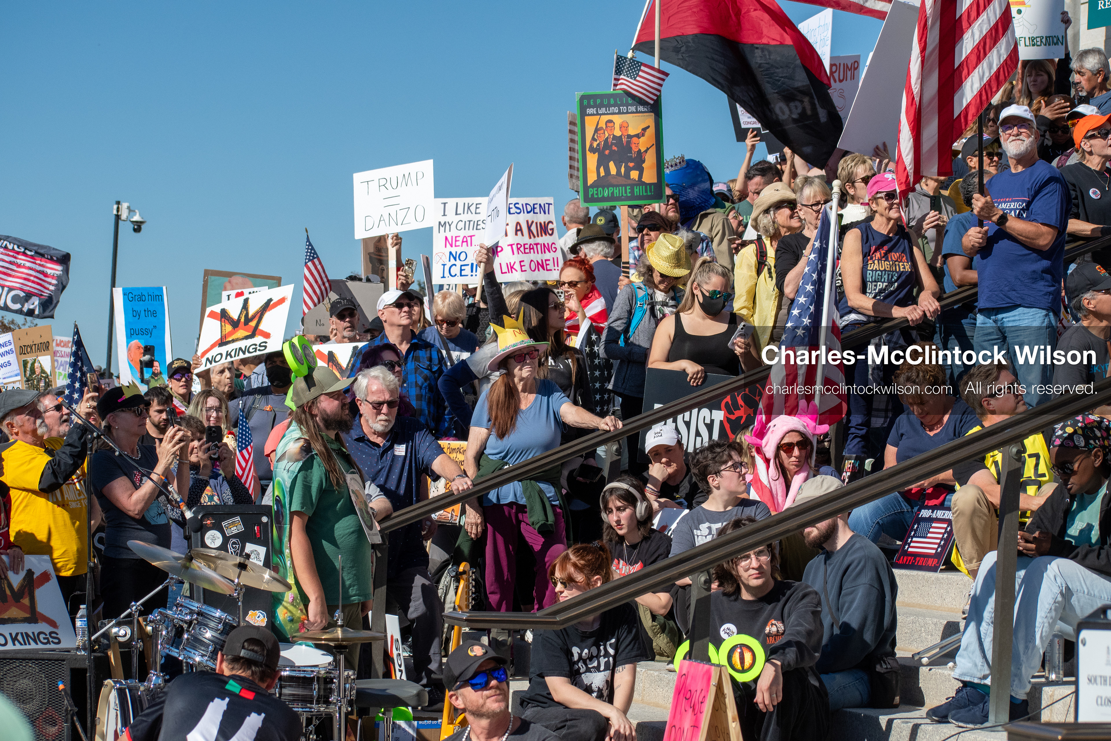 October 18, 2025, Salt Lake City, Utah, USA: Demonstrators participate in a "No Kings" protest held at the Utah State Capitol. Participants hold signs and flags during the public gathering.