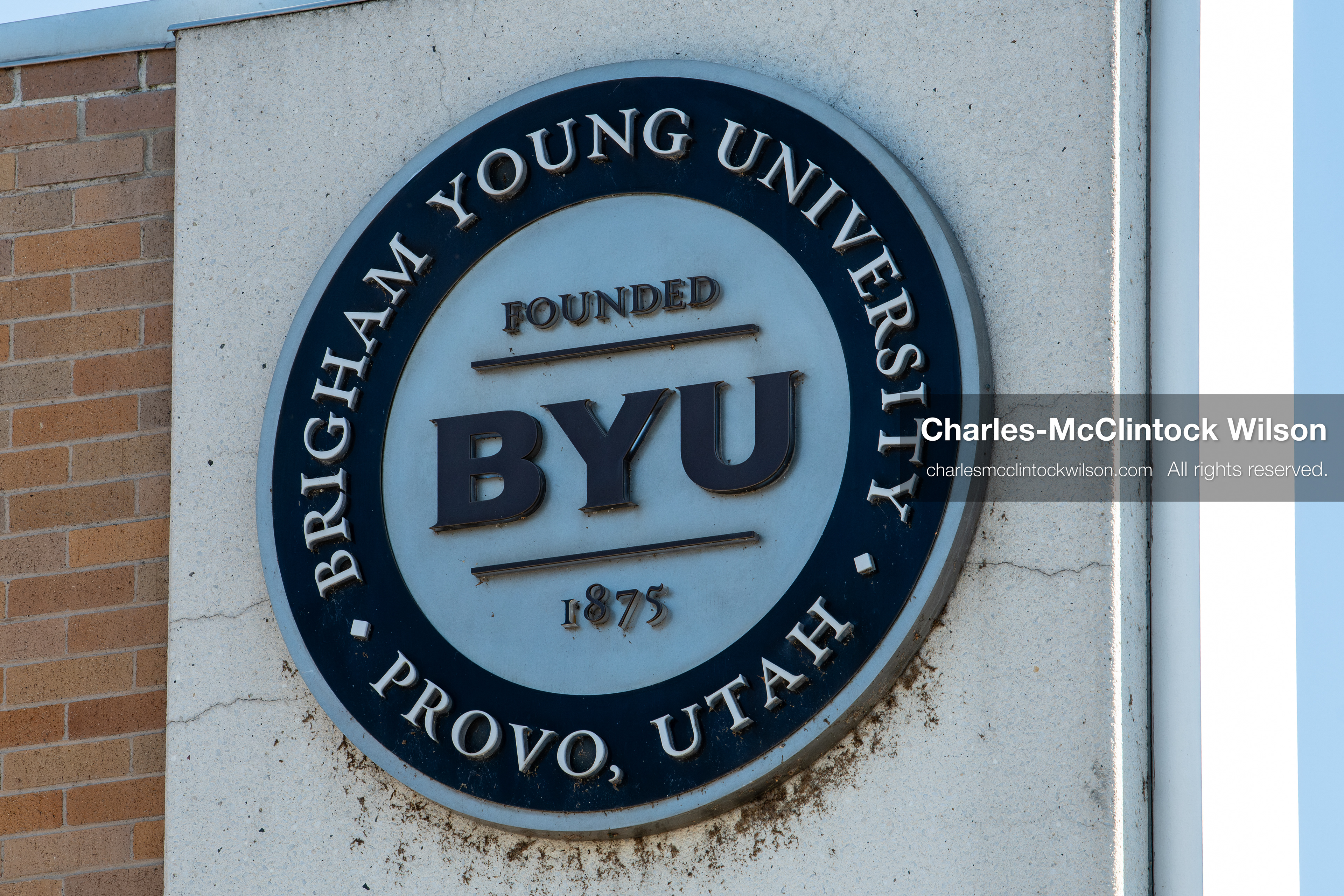 February 5, 2026, Provo, Utah, USA: A Brigham Young University emblem is displayed on a wall on the BYU campus in Provo during a protest opposing the presence of US Customs and Border Protection recruiters at a career fair held at the university. (Credit Image: © Charles McClintock Wilson/ZUMA Press Wire)