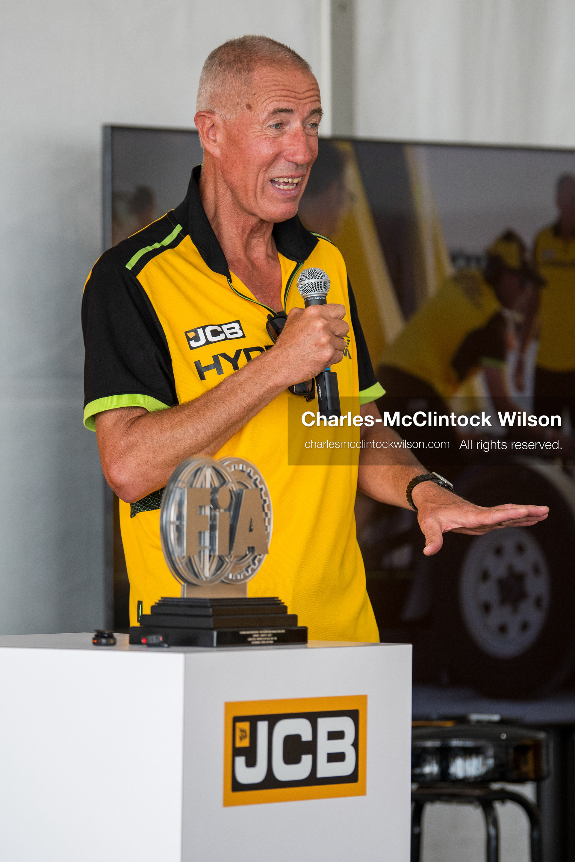  August 11, 2026, Wendover, Utah, USA: British pilot ANDY GREEN speaks into a microphone during a press conference at the Bonneville Salt Flats on Tuesday. Green piloted the hydrogen-powered ''JCB Hydromax'' streamliner to a historic record-breaking top speed of 406.320 mph. (Credit Image: © Charles McClintock Wilson/ZUMA Press Wire)