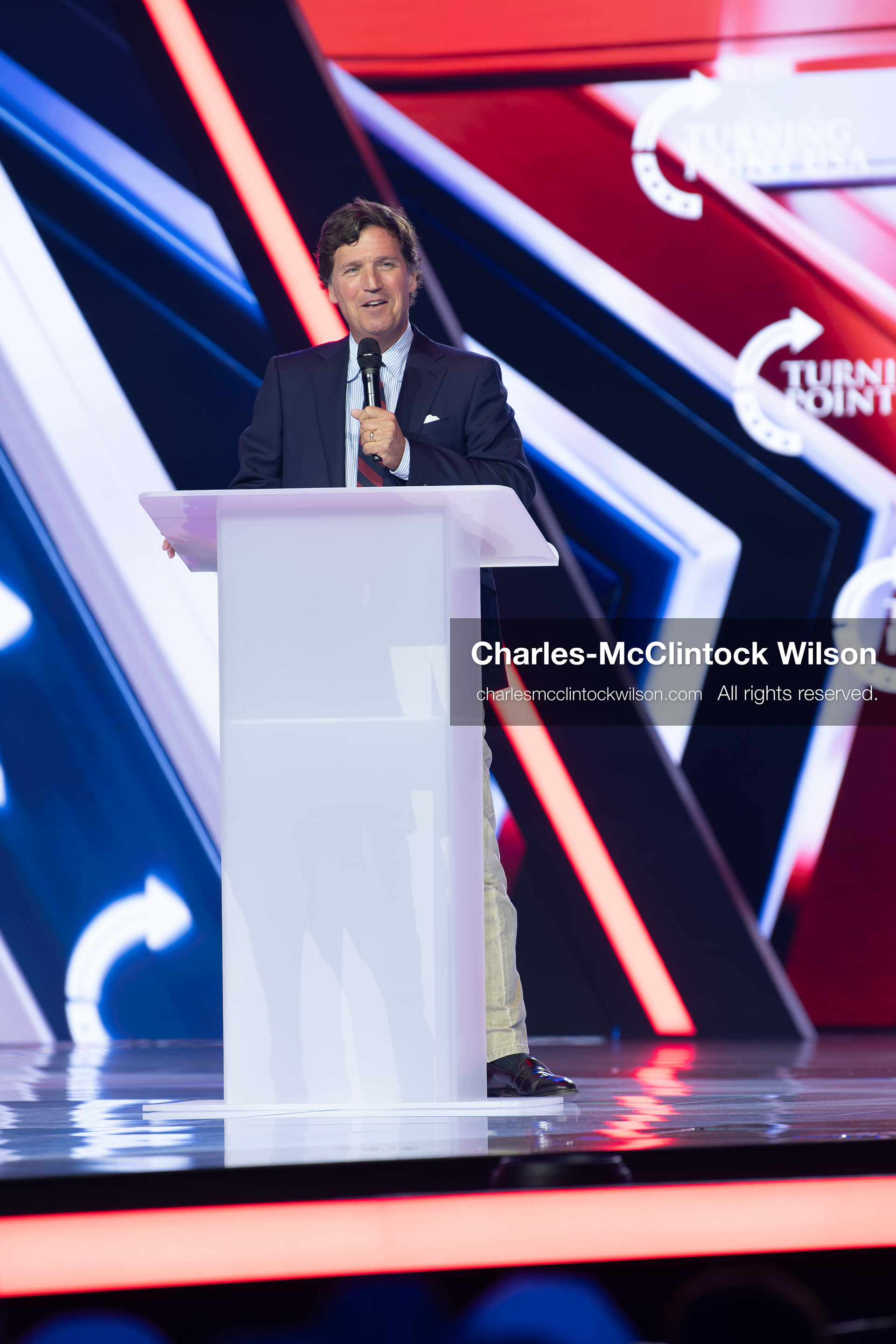 December 18, 2025, Phoenix, Arizona, USA: Tucker Carlson speaks on Day One of Turning Point USA’s AmericaFest 2025 at the Phoenix Convention Center in Phoenix, Arizona.   (Credit Image: © Charles‑McClintock Wilson/ZUMA Press Wire)